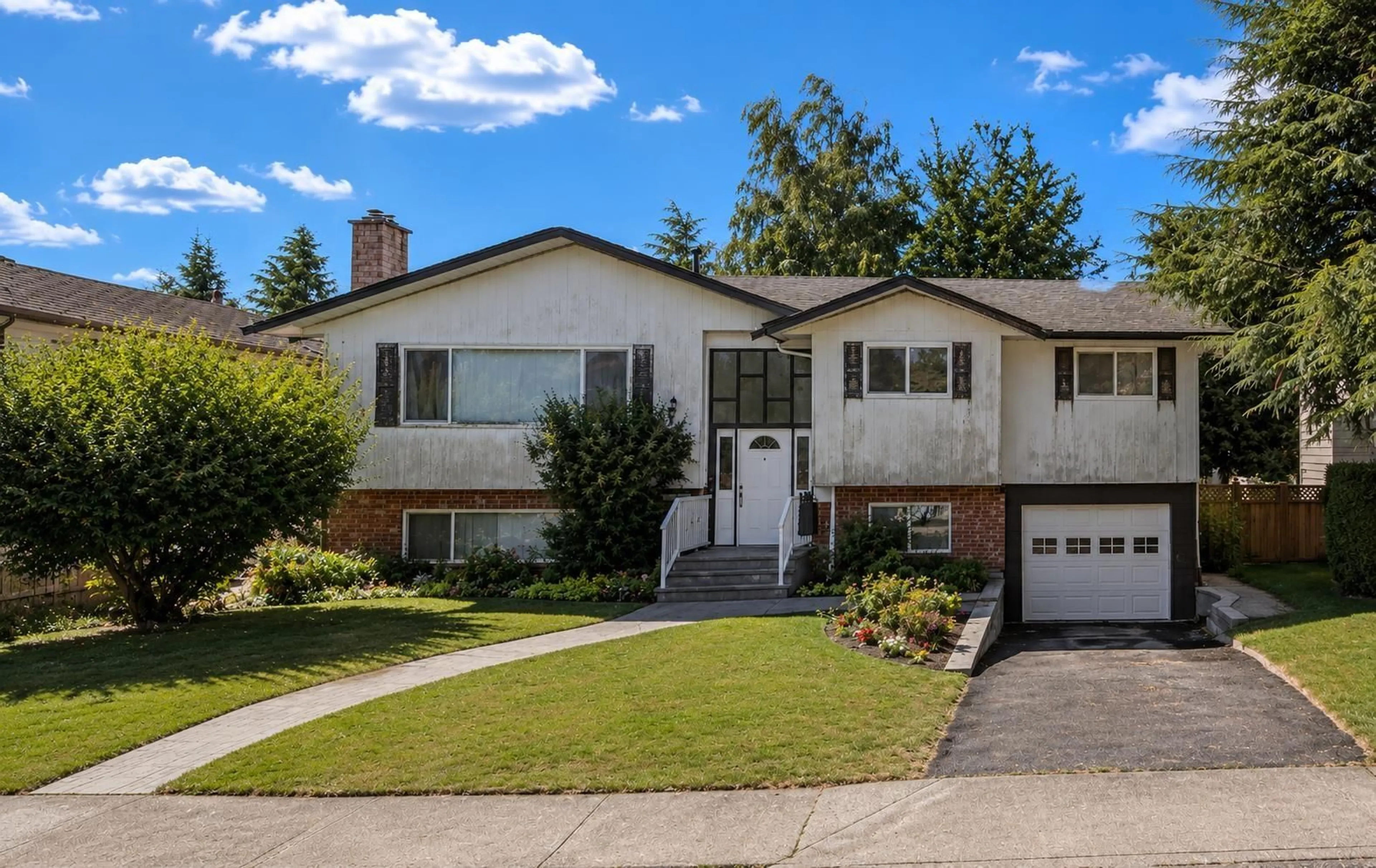Home with vinyl exterior material, street for 11410 75B AVENUE, Delta British Columbia V4C1K3
