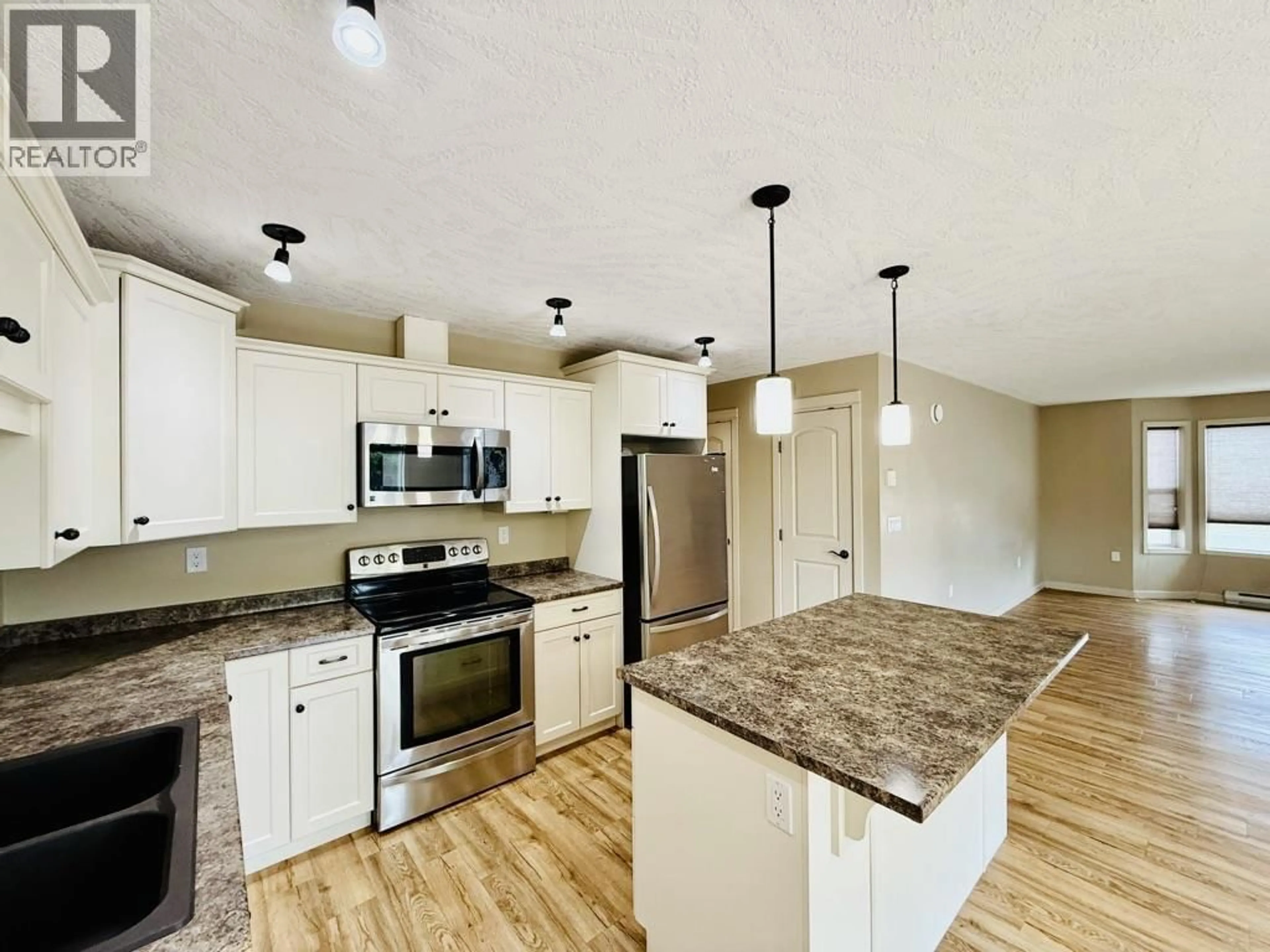 Open concept kitchen, ceramic/tile floor for 2 - 3664 THIRD AVENUE, Smithers British Columbia V0J2N0