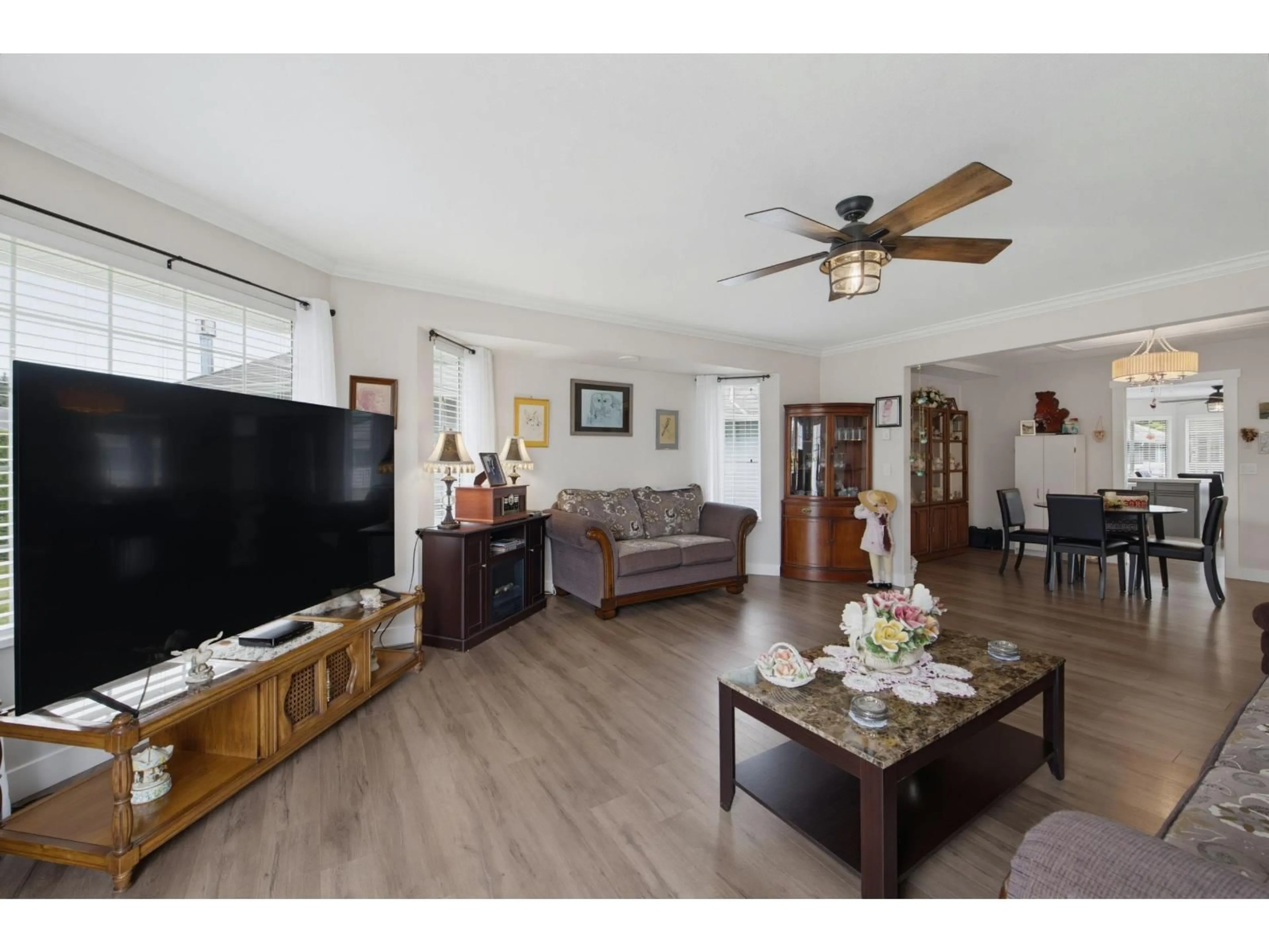 Living room with furniture, wood/laminate floor for 56 - 1450 MCCALLUM ROAD, Abbotsford British Columbia V2S8A5