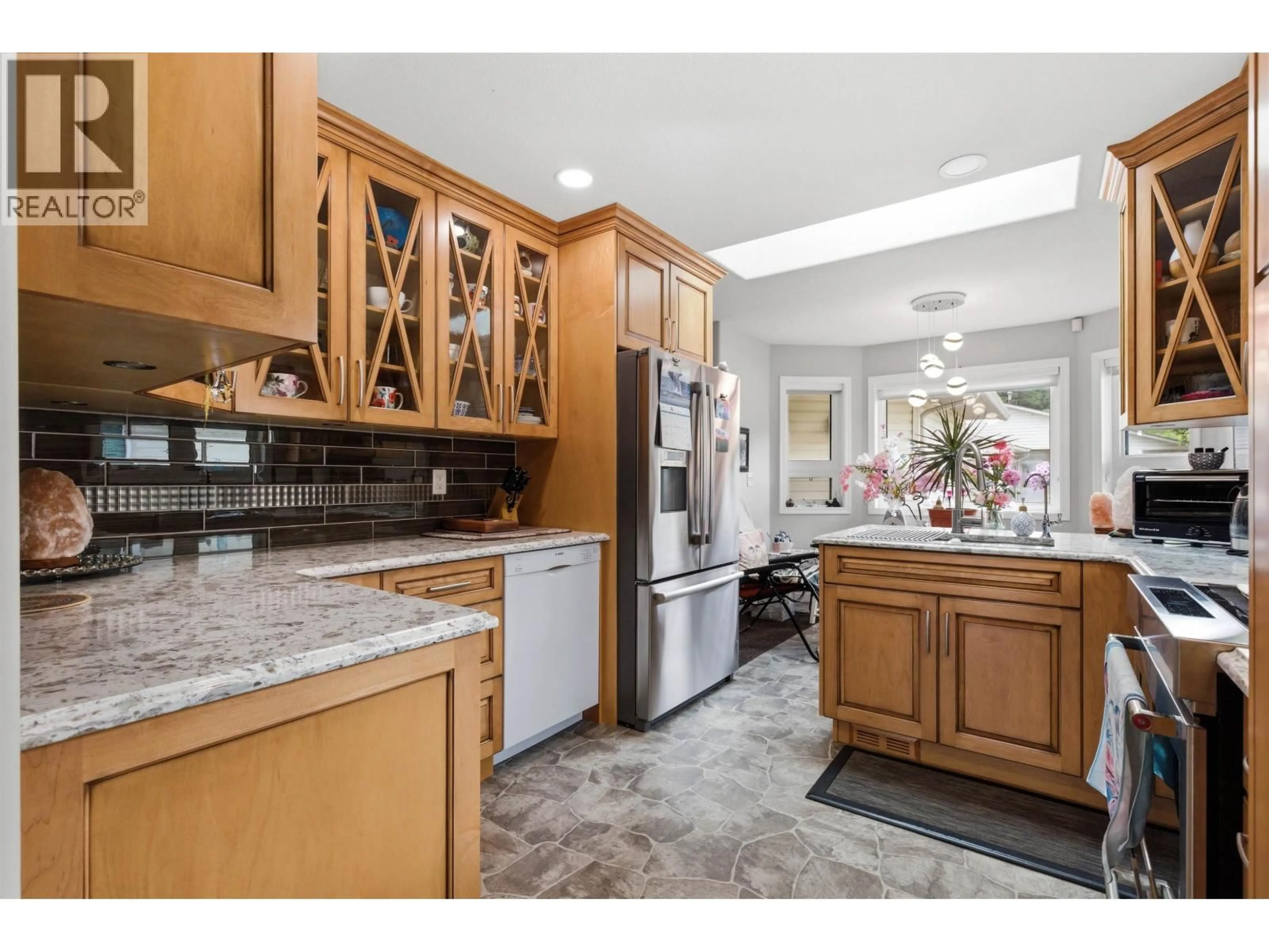 Open concept kitchen, ceramic/tile floor for 58 - 500 WOTZKE DRIVE, Williams Lake British Columbia V2G4S9