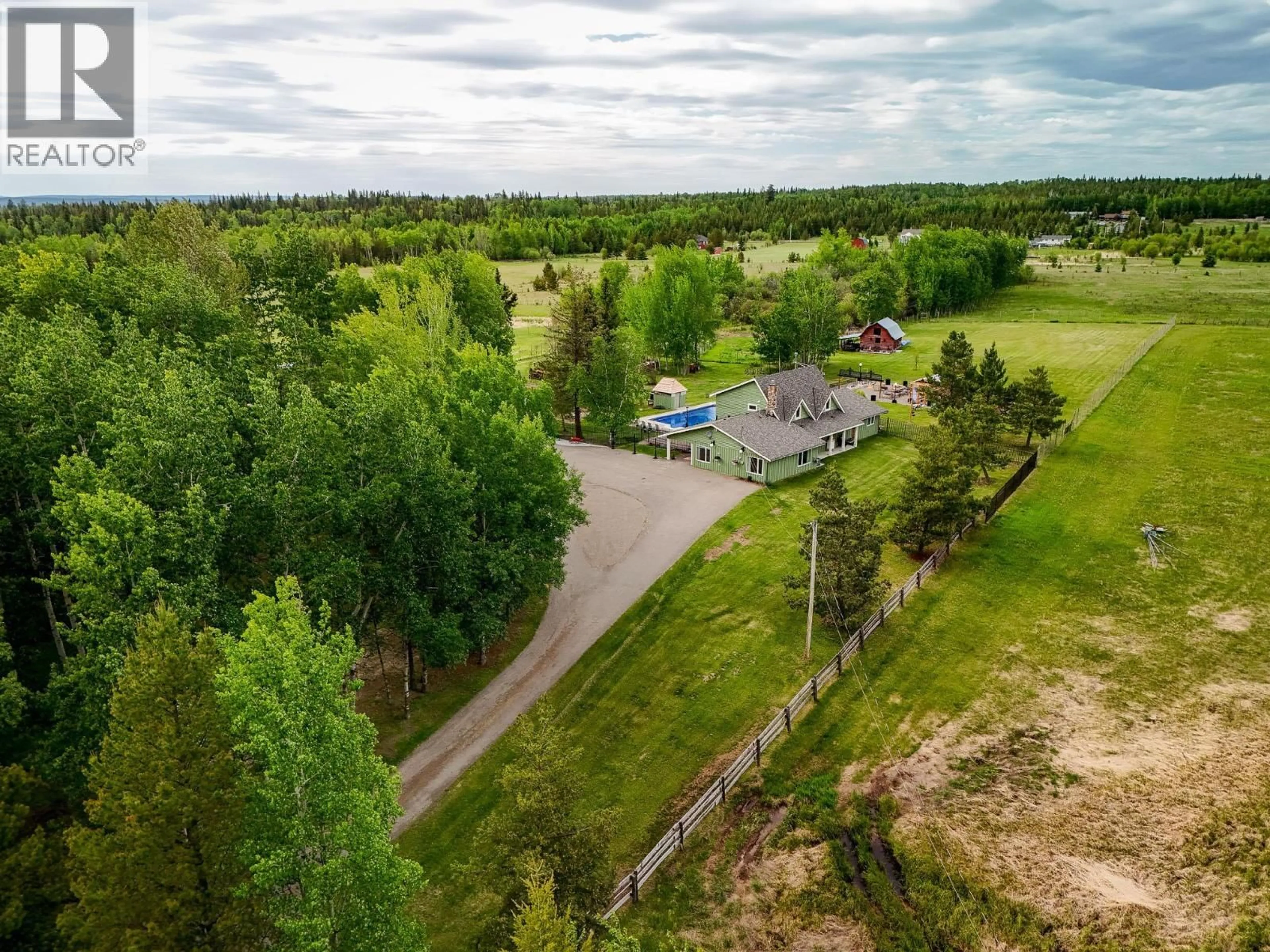 A pic from outside/outdoor area/front of a property/back of a property/a pic from drone, forest/trees view for 11320 SMAASLET ROAD, Prince George British Columbia V2N5A7
