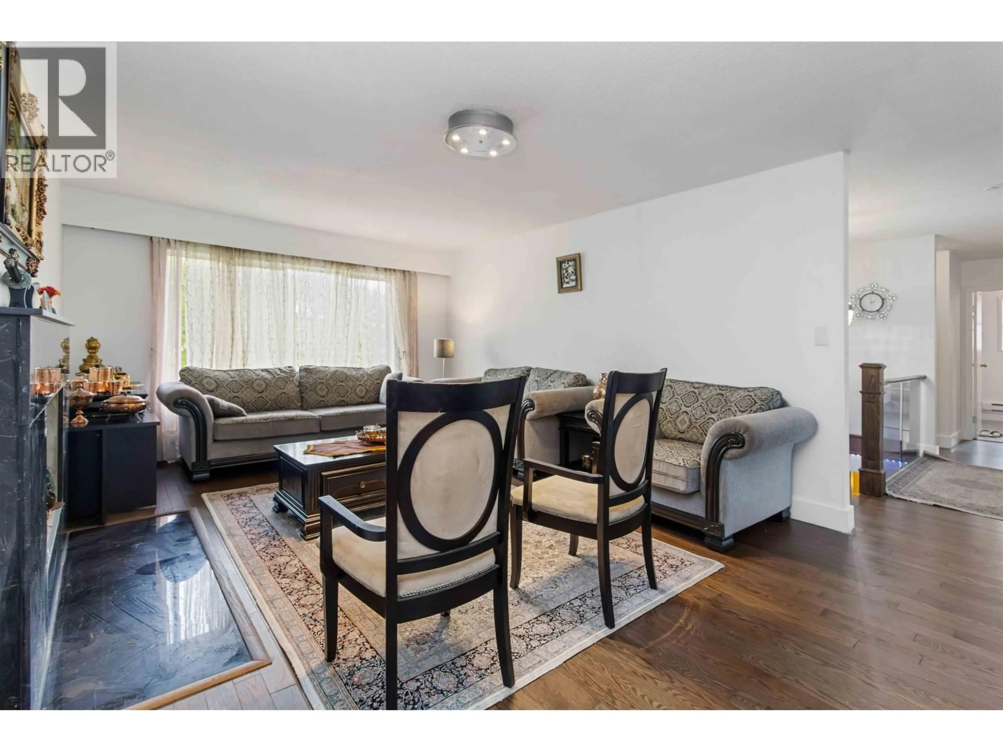 Living room with furniture, wood/laminate floor for 759 MORGAN ROAD, North Vancouver British Columbia V7J1P3