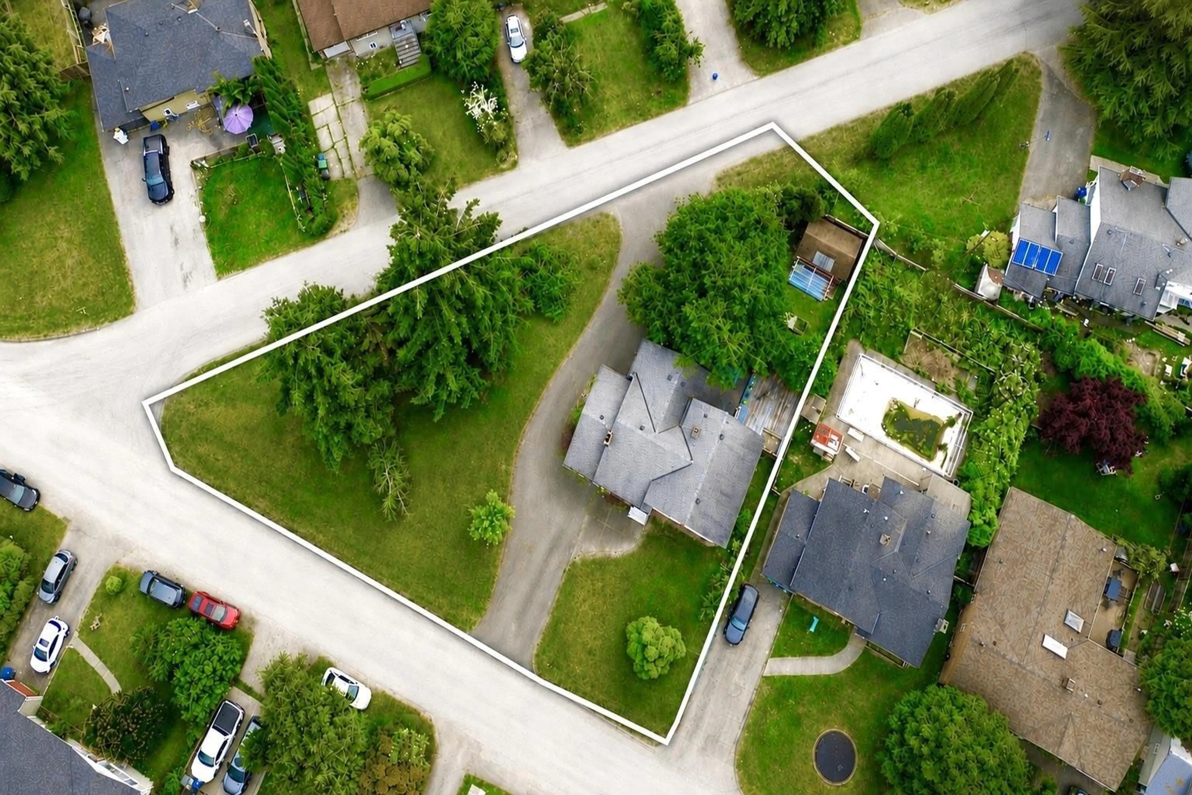 A pic from outside/outdoor area/front of a property/back of a property/a pic from drone, street for 11063 135A STREET, Surrey British Columbia V3R3A6