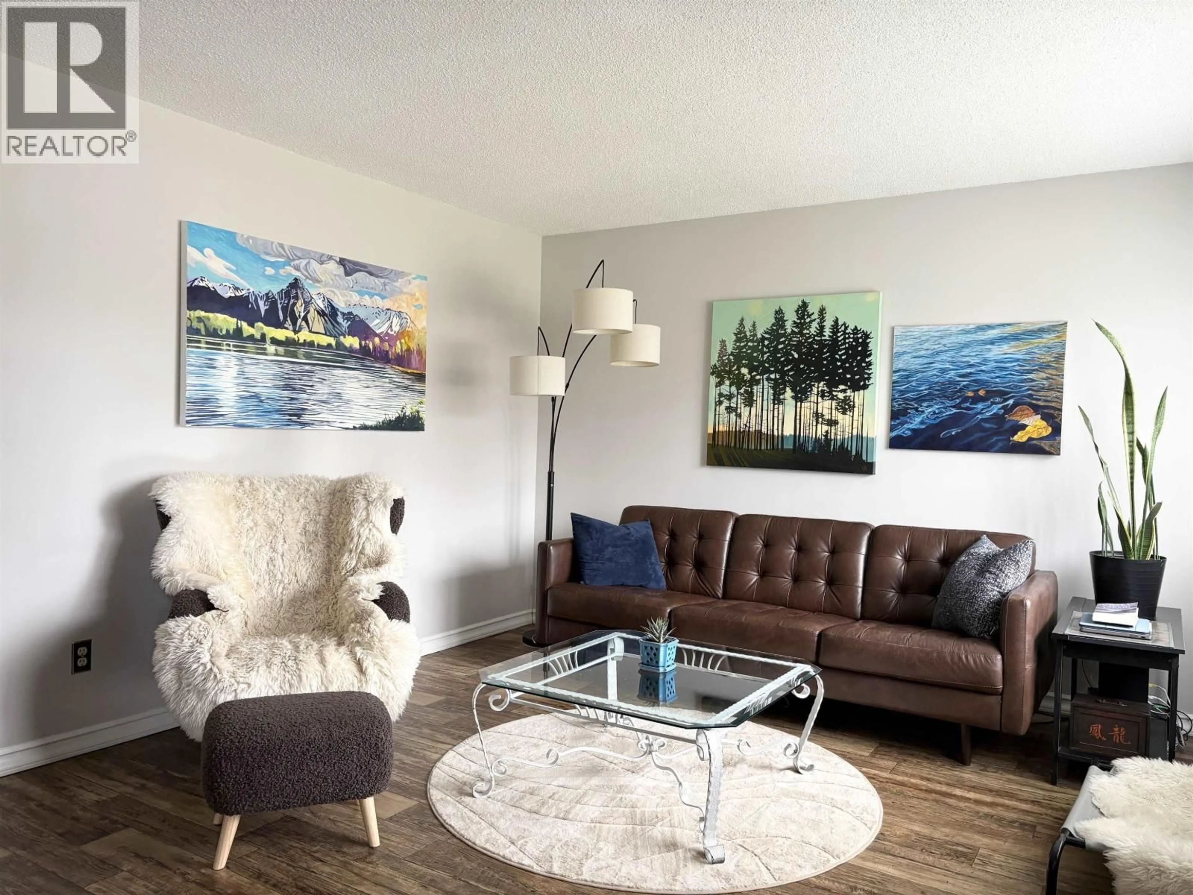 Living room with furniture, wood/laminate floor for 2375 SHEARER CRESCENT, Prince George British Columbia V2N3B7