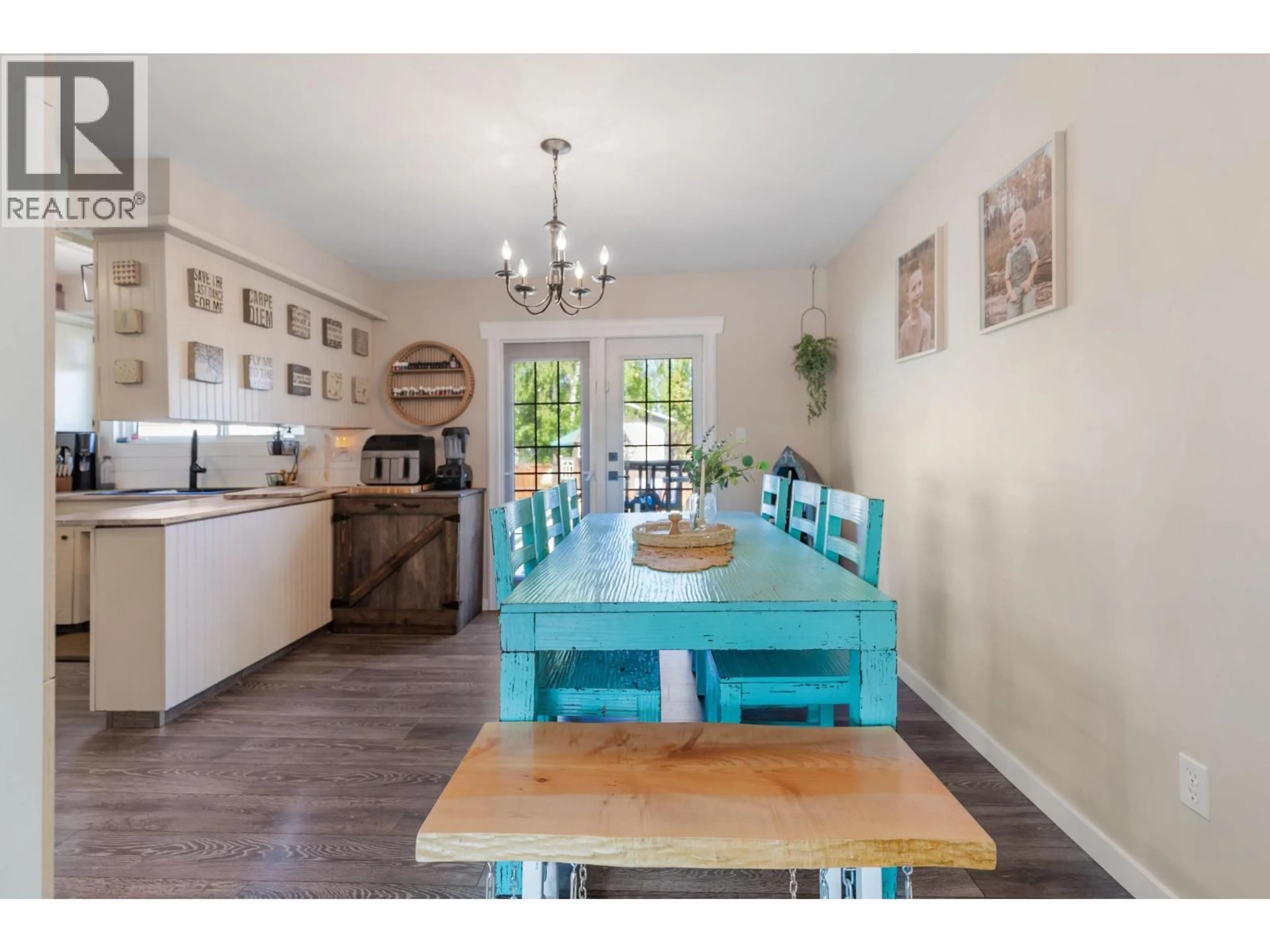 Open concept kitchen, wood/laminate floor for 3908 ENEMARK CRESCENT, Prince George British Columbia V2N2X5