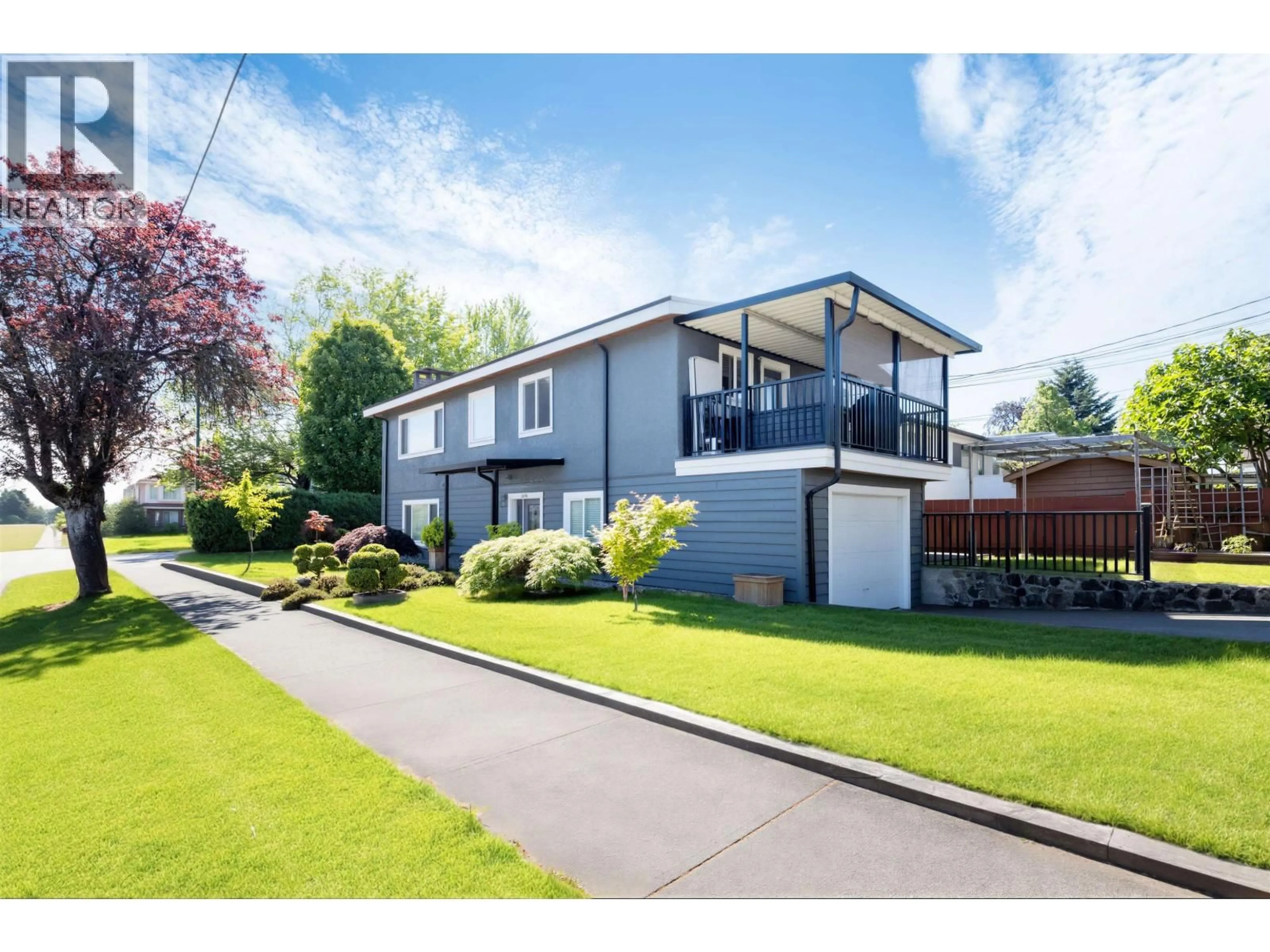 A pic from outside/outdoor area/front of a property/back of a property/a pic from drone, street for 3696 26TH AVENUE, Vancouver British Columbia V5R1M7