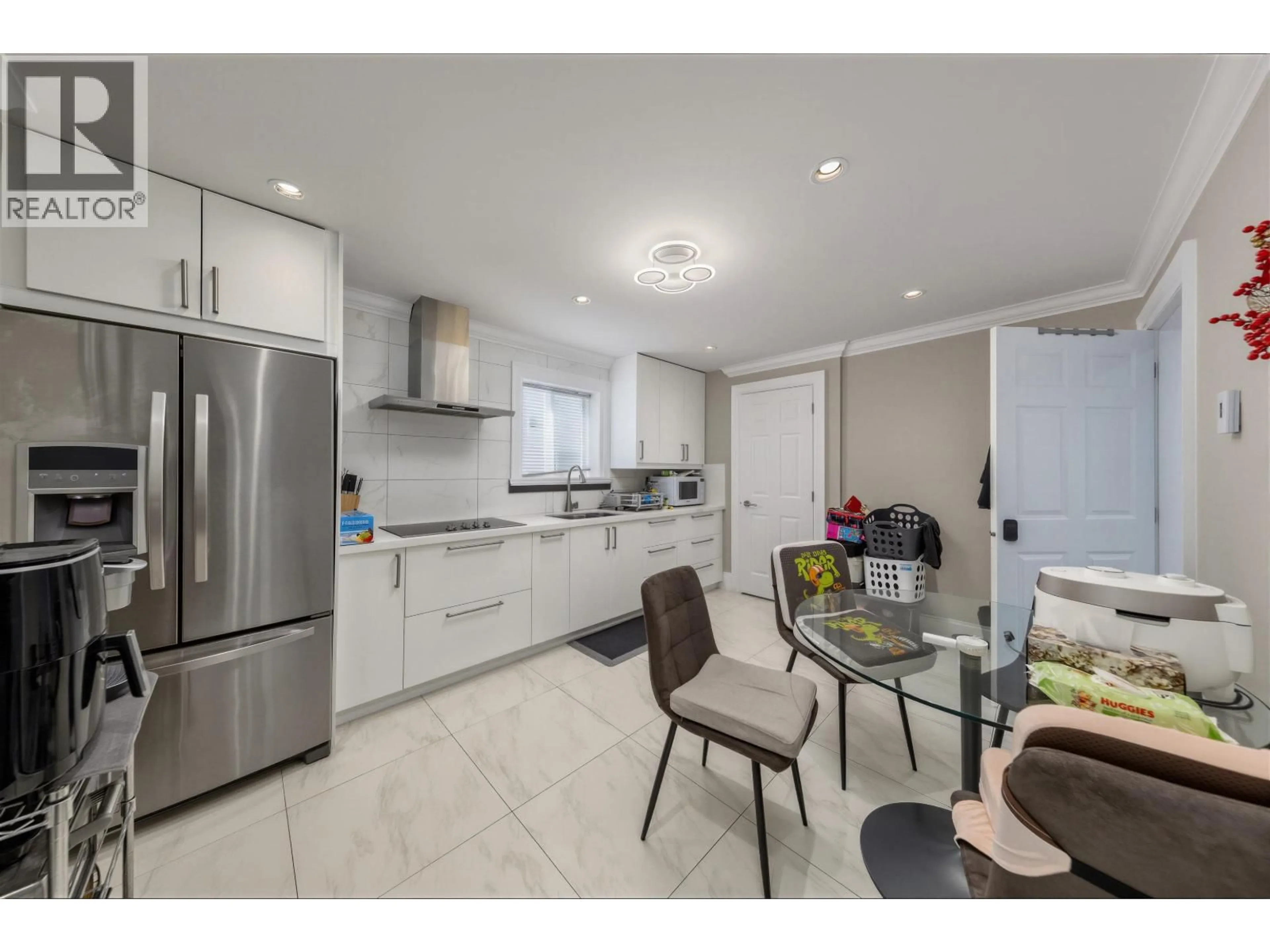 Open concept kitchen, ceramic/tile floor for 3696 26TH AVENUE, Vancouver British Columbia V5R1M7
