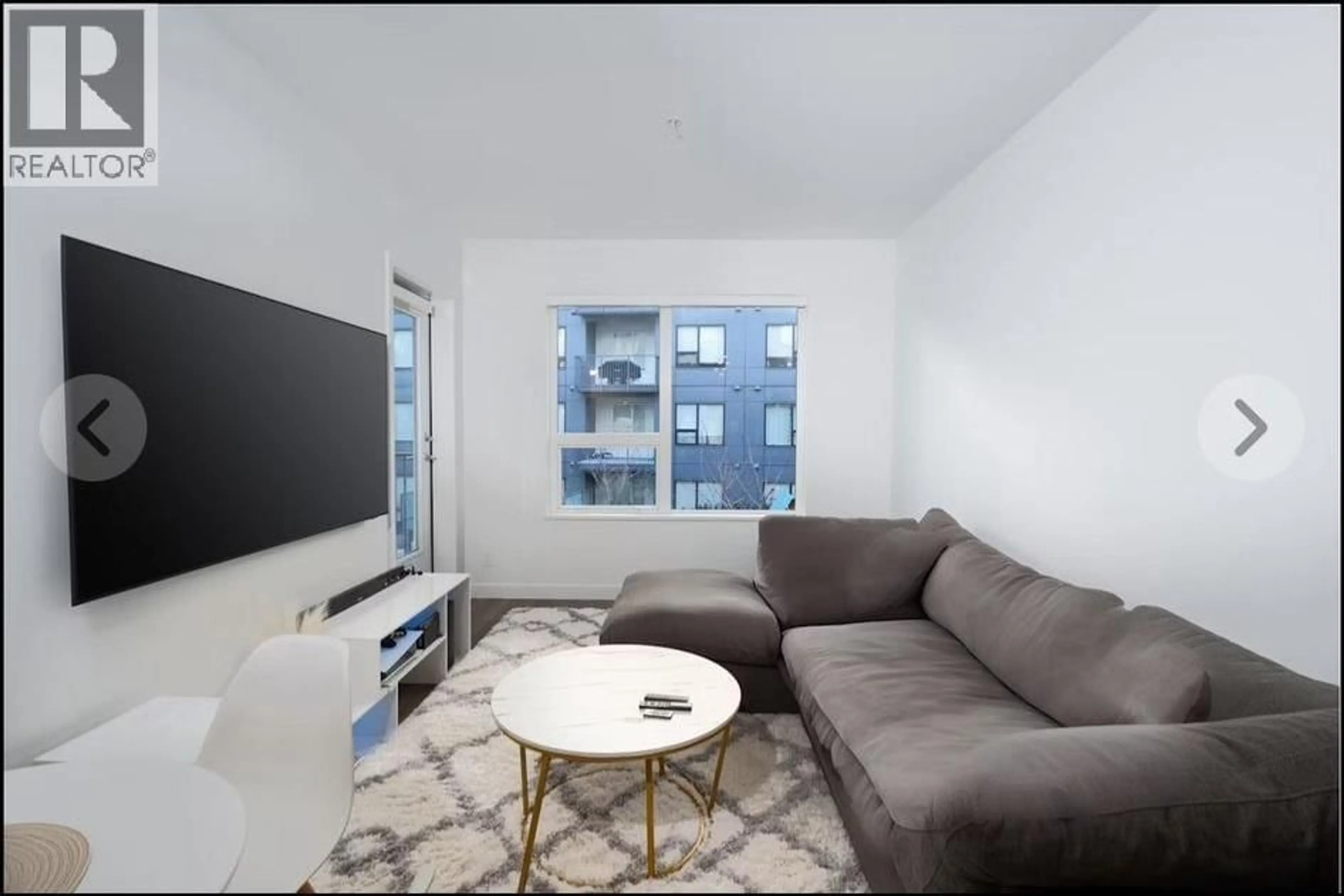 Living room with furniture, unknown for 217 - 645 COMO LAKE AVENUE, Coquitlam British Columbia V3J0N9