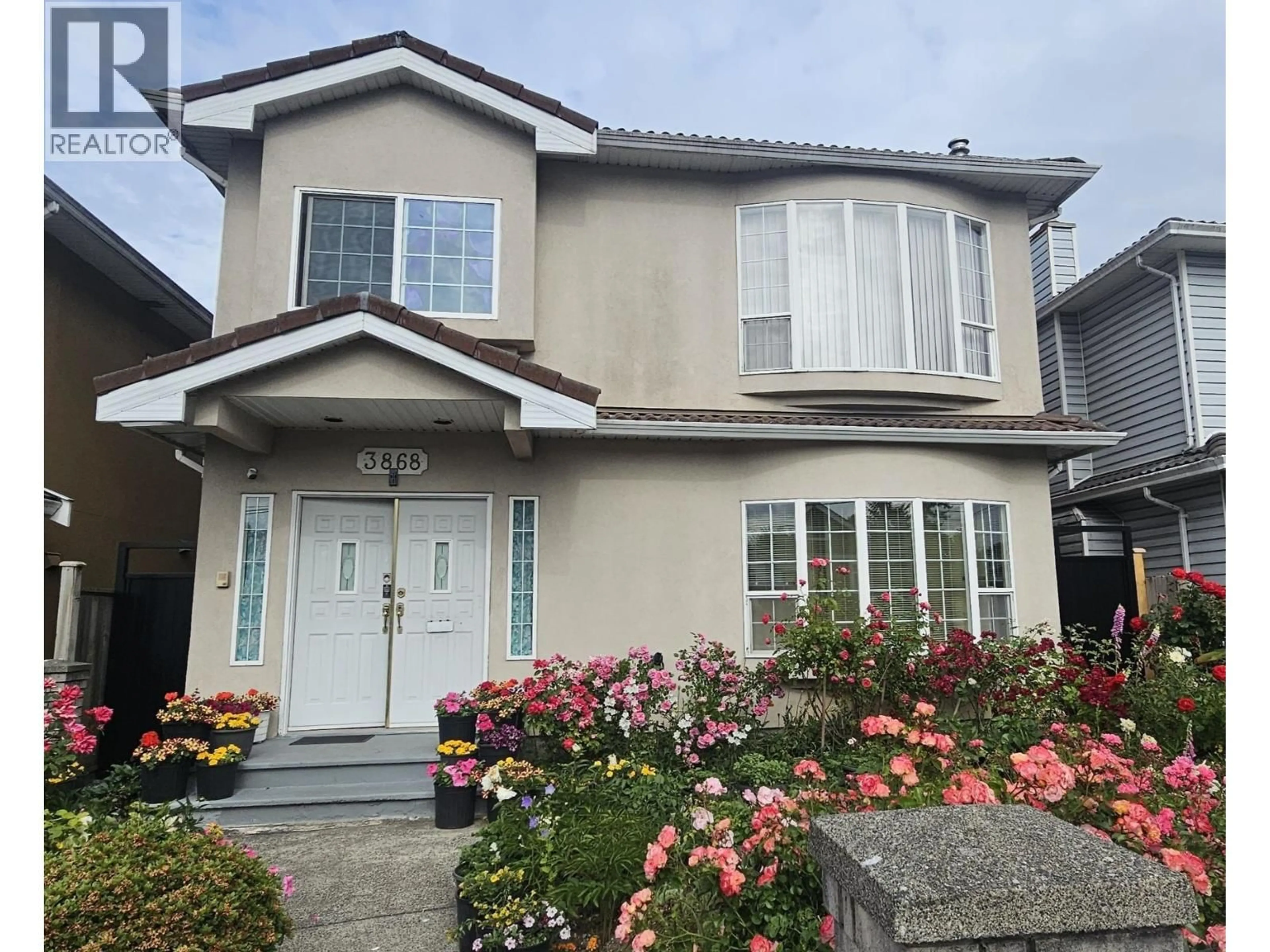 Home with vinyl exterior material, street for 3868 VICTORIA DRIVE, Vancouver British Columbia V5N4M8