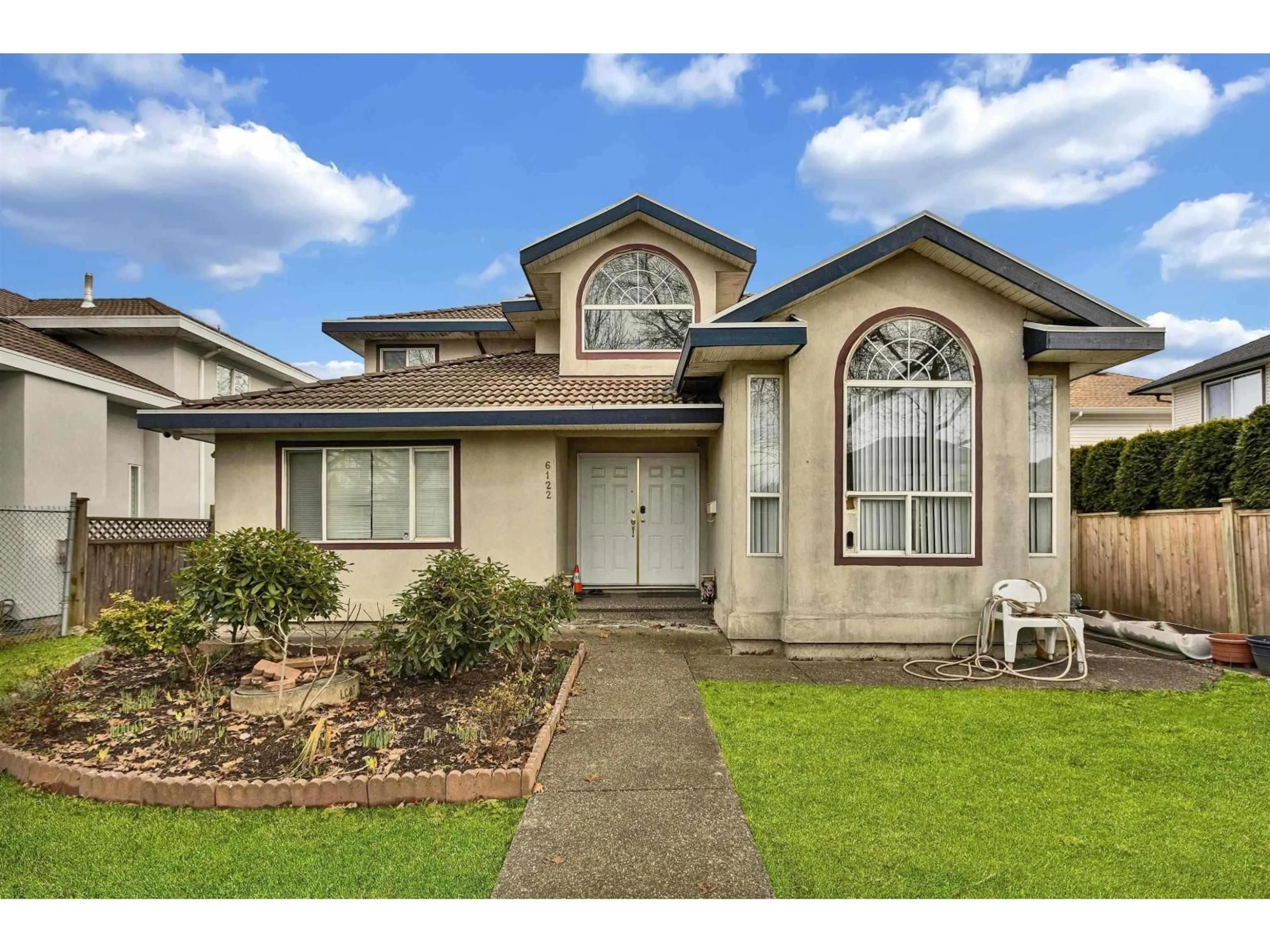 Home with vinyl exterior material, street for 6122 168 STREET, Surrey British Columbia V3S3X8