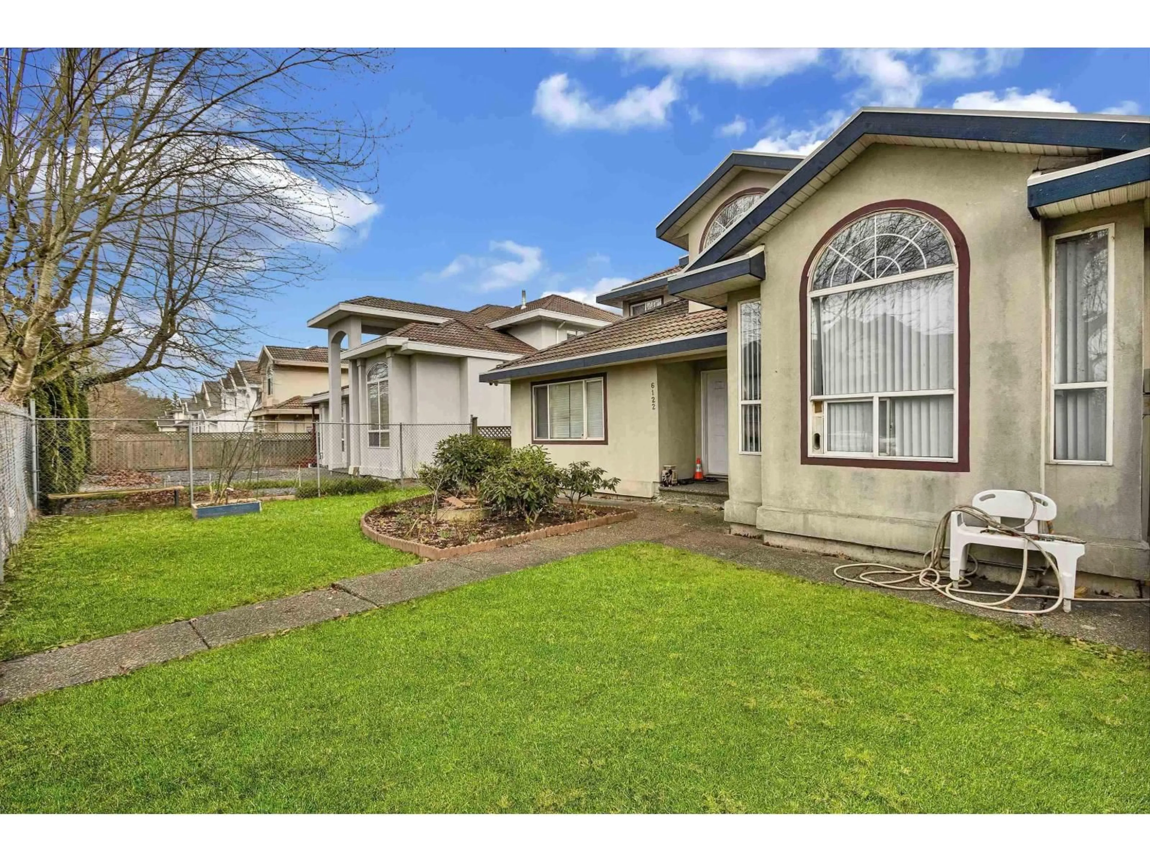A pic from outside/outdoor area/front of a property/back of a property/a pic from drone, street for 6122 168 STREET, Surrey British Columbia V3S3X8