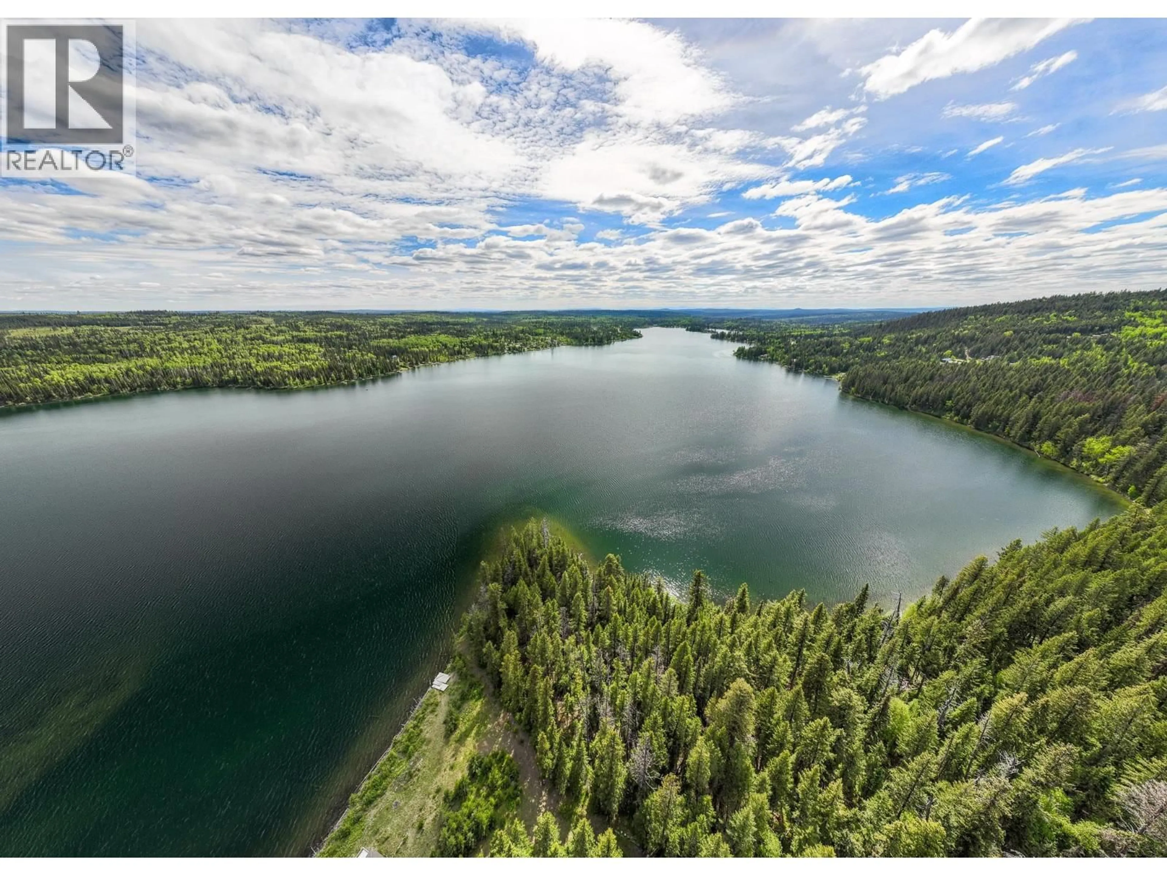 A pic from outside/outdoor area/front of a property/back of a property/a pic from drone, water/lake/river/ocean view for 7750 BURGESS ROAD, Deka Lake / Sulphurous / Hathaway Lakes British Columbia V0K1X3
