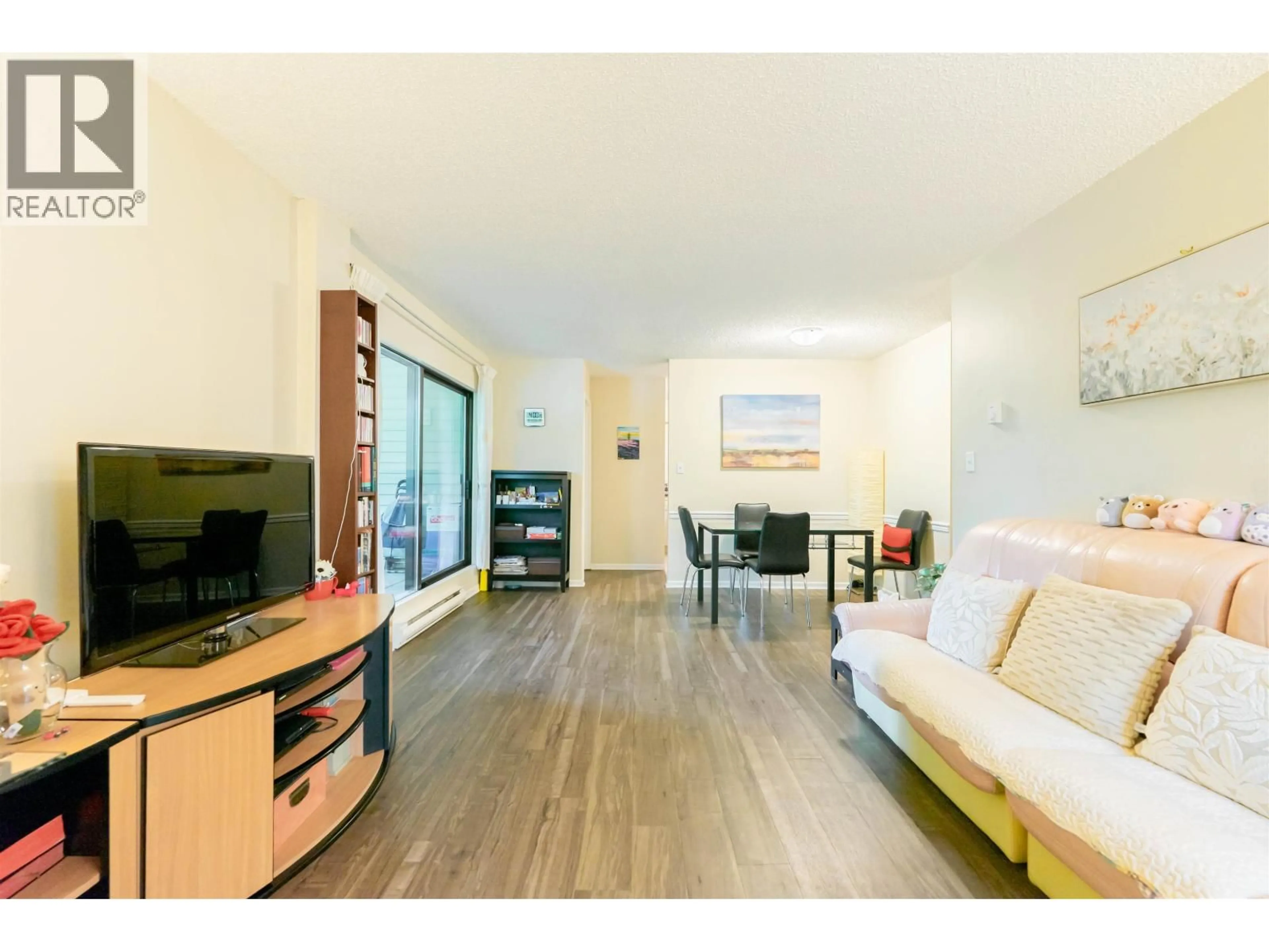 Living room with furniture, wood/laminate floor for 222 - 8231 GRANVILLE AVENUE, Richmond British Columbia V6Y3A4
