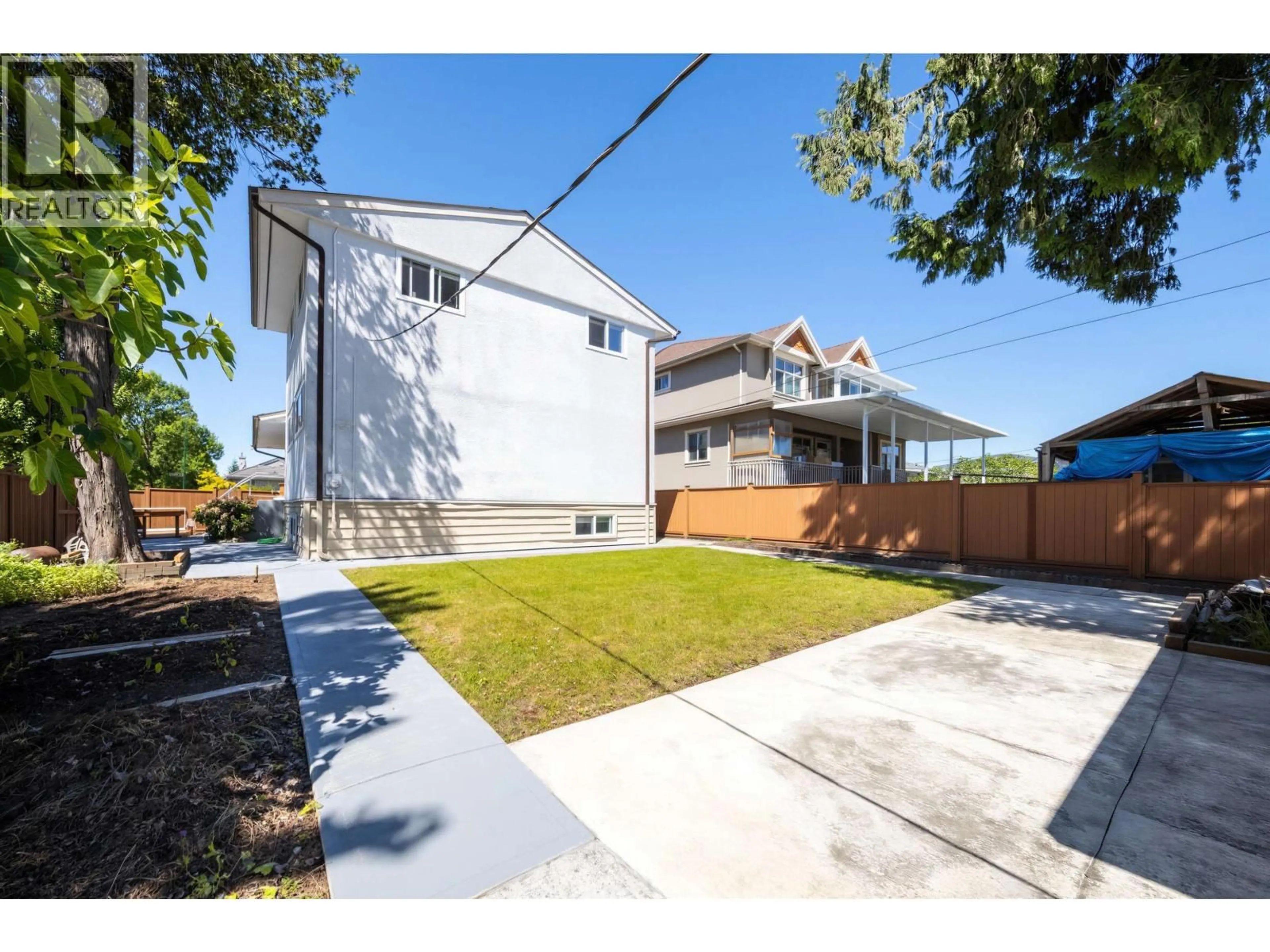 A pic from outside/outdoor area/front of a property/back of a property/a pic from drone, street for 2911 51ST AVENUE, Vancouver British Columbia V5S1R7