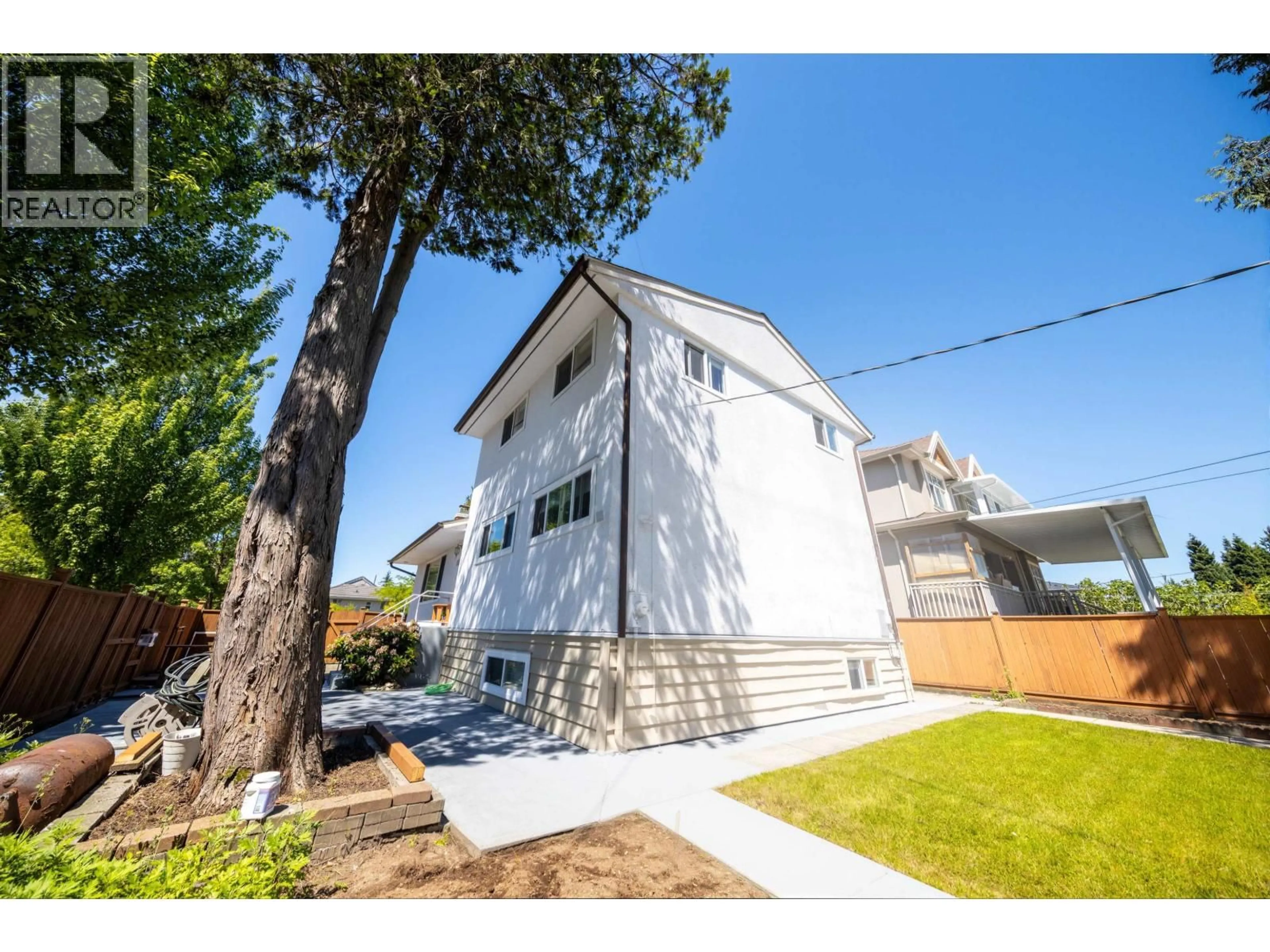 Home with vinyl exterior material, street for 2911 51ST AVENUE, Vancouver British Columbia V5S1R7