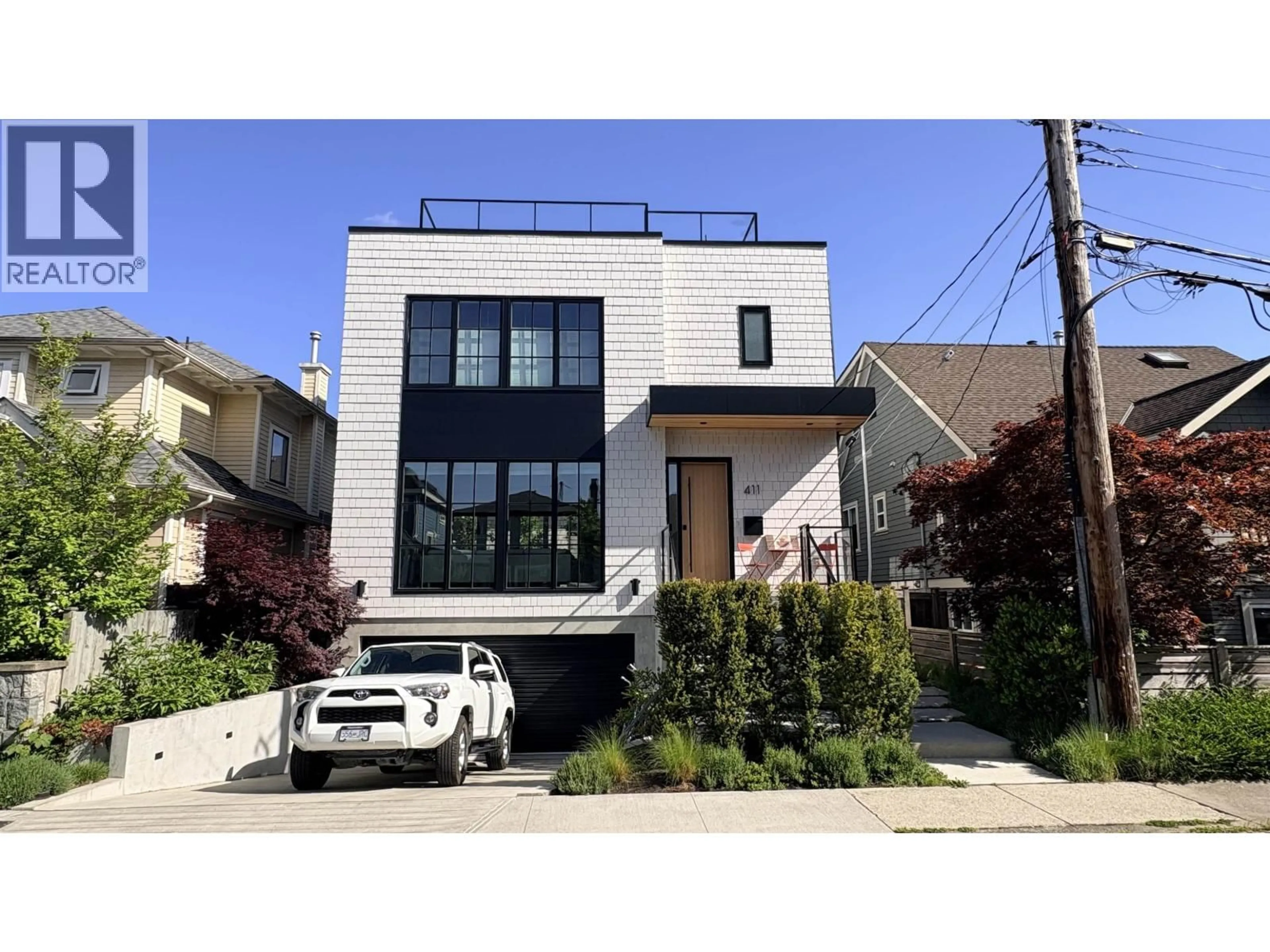 Home with brick exterior material, street for 411 AUBREY PLACE, Vancouver British Columbia V5V2T5