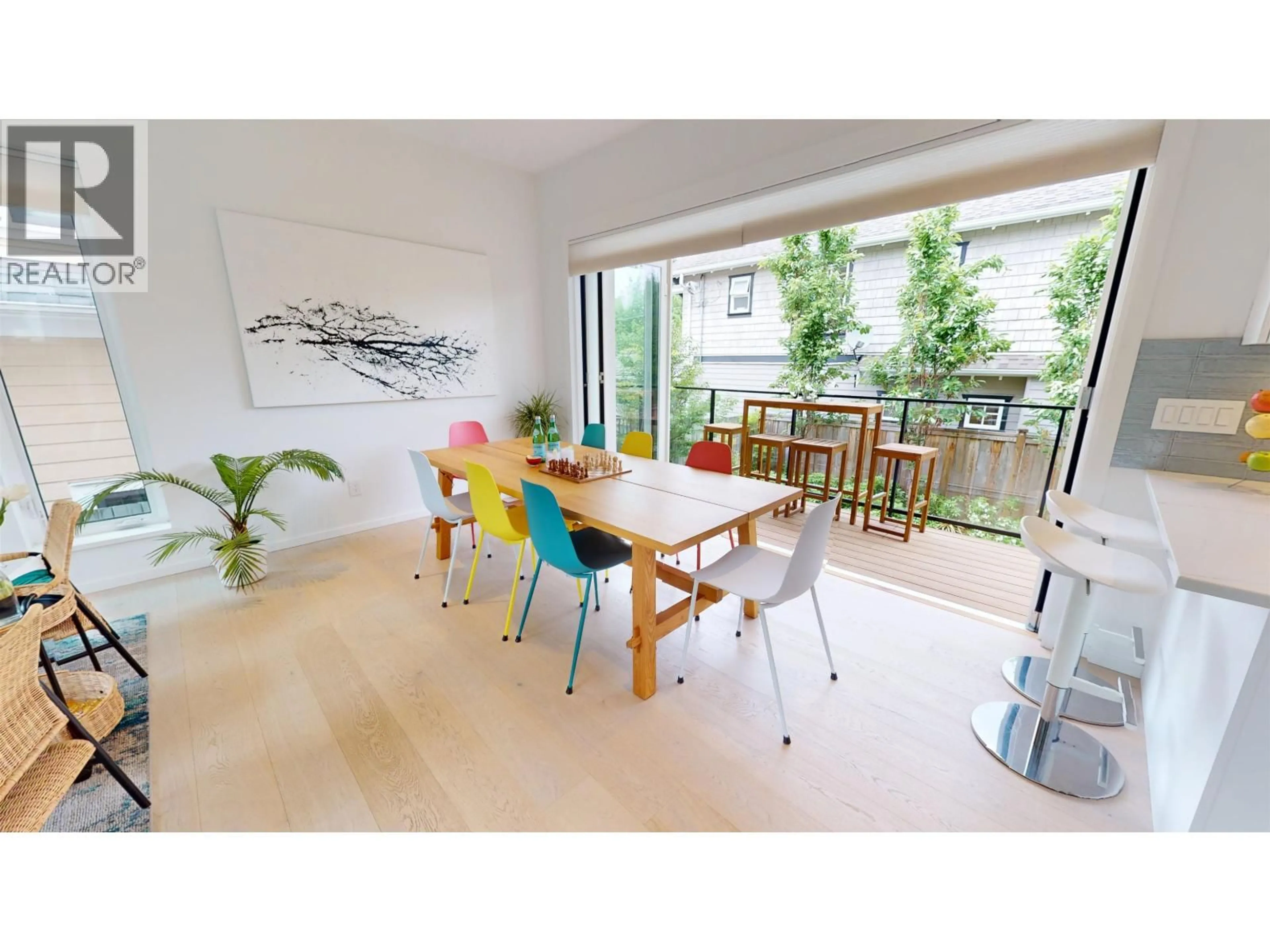 Dining room, wood/laminate floor for 411 AUBREY PLACE, Vancouver British Columbia V5V2T5