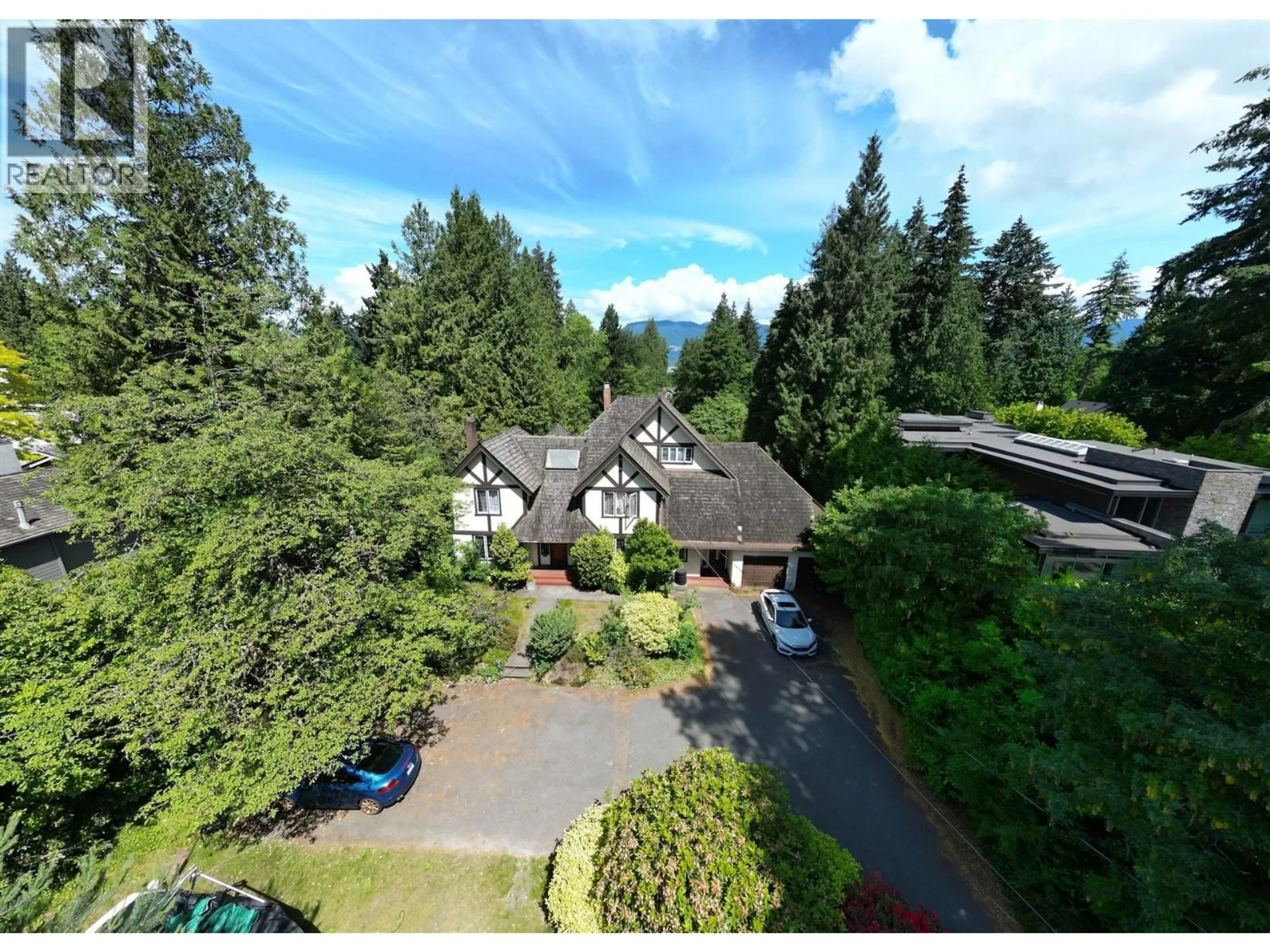 A pic from outside/outdoor area/front of a property/back of a property/a pic from drone, mountain view for 4755 4TH AVENUE, Vancouver British Columbia V6T1C3