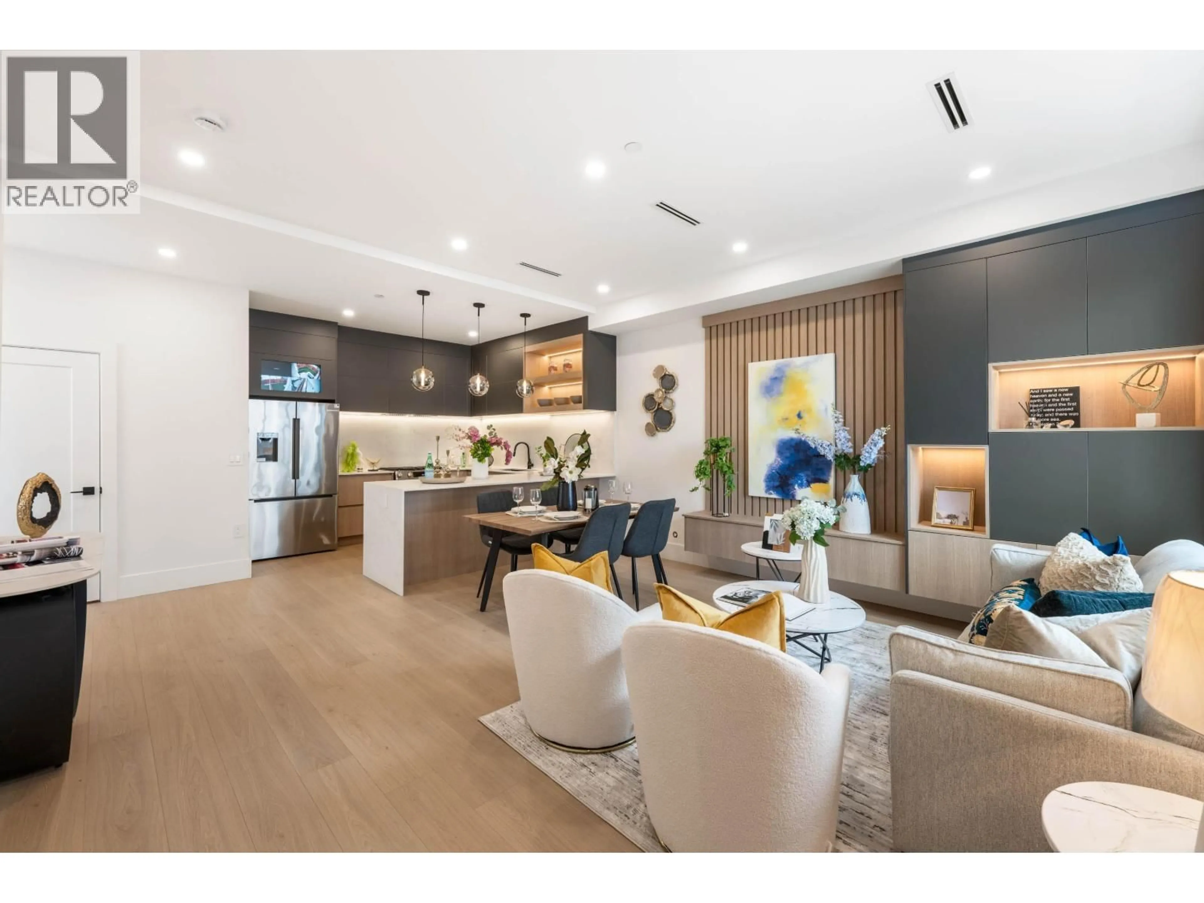 Open concept kitchen, wood/laminate floor for 2 - 3065 CHARLES STREET, Vancouver British Columbia V5K3B6