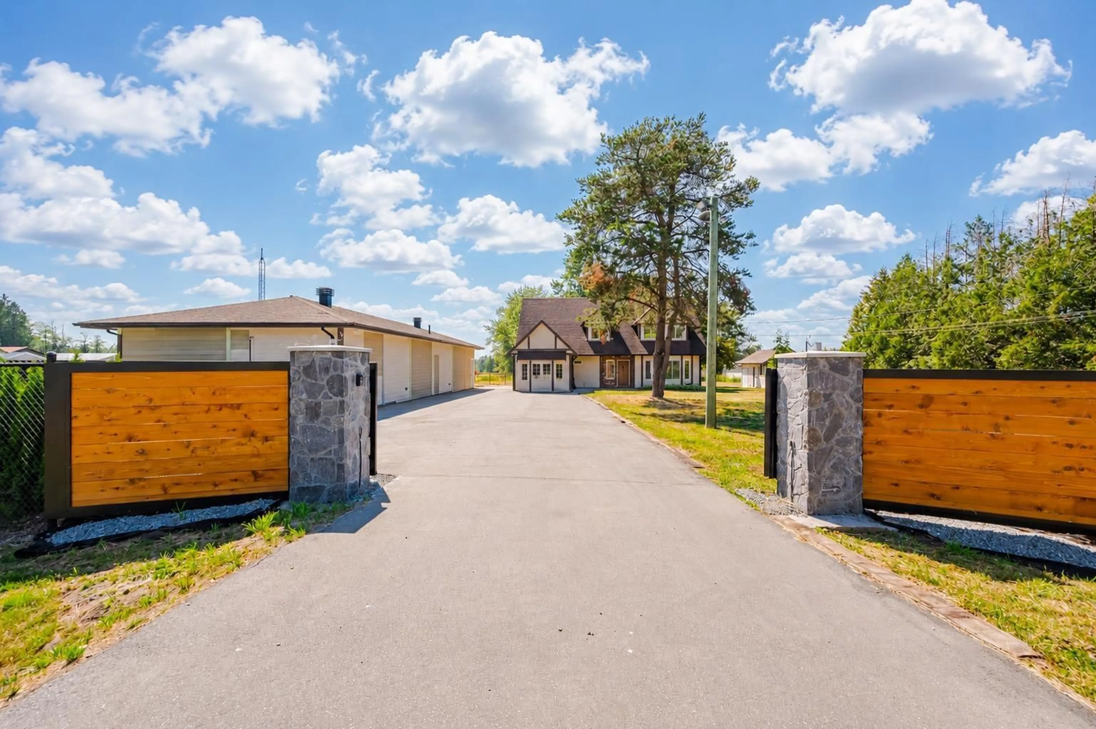 A pic from outside/outdoor area/front of a property/back of a property/a pic from drone, street for 2565 216 STREET, Langley British Columbia V2Z1P4