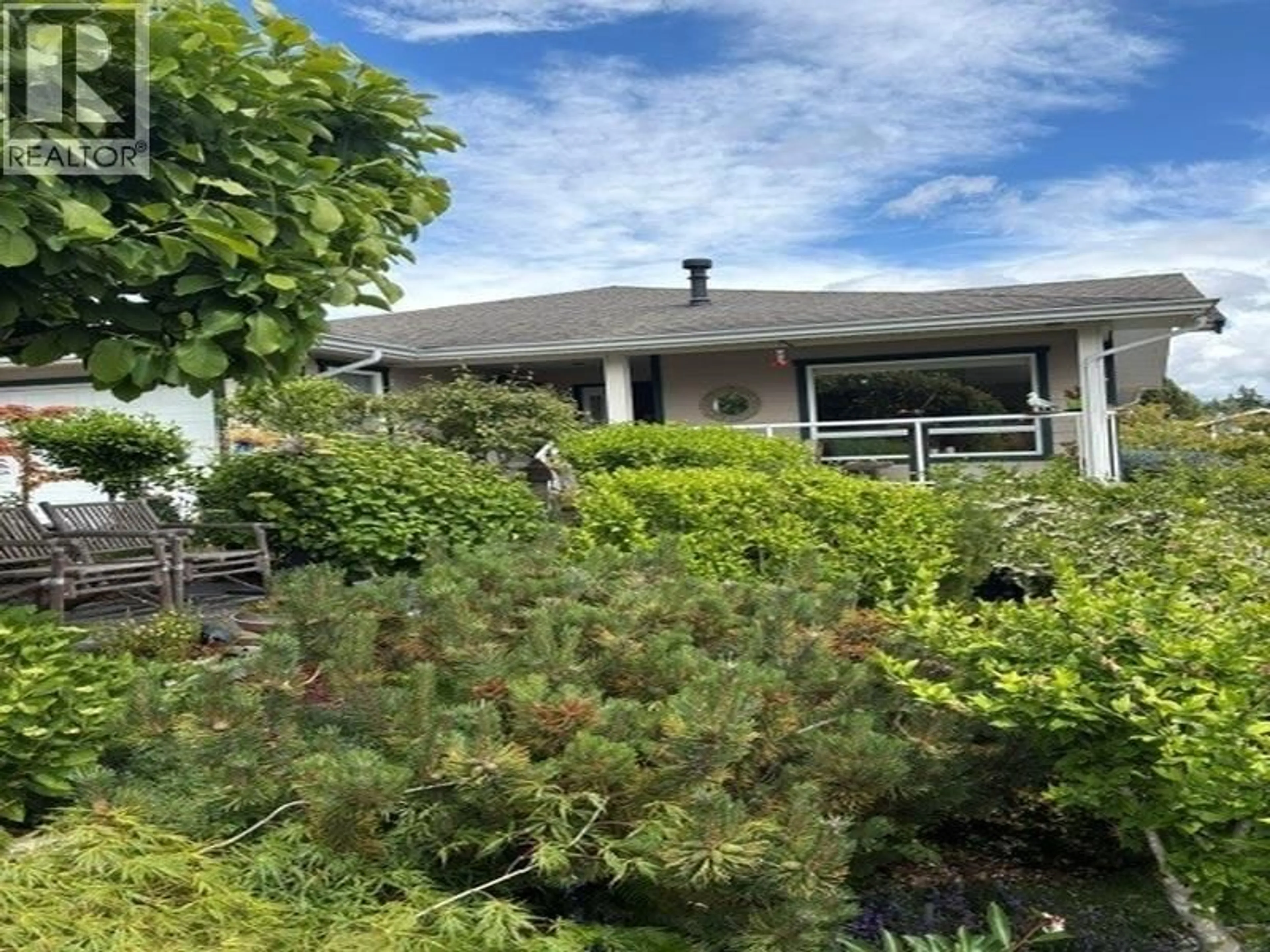 A pic from outside/outdoor area/front of a property/back of a property/a pic from drone, unknown for 6252 BAILLIE ROAD, Sechelt British Columbia V7Z0R5