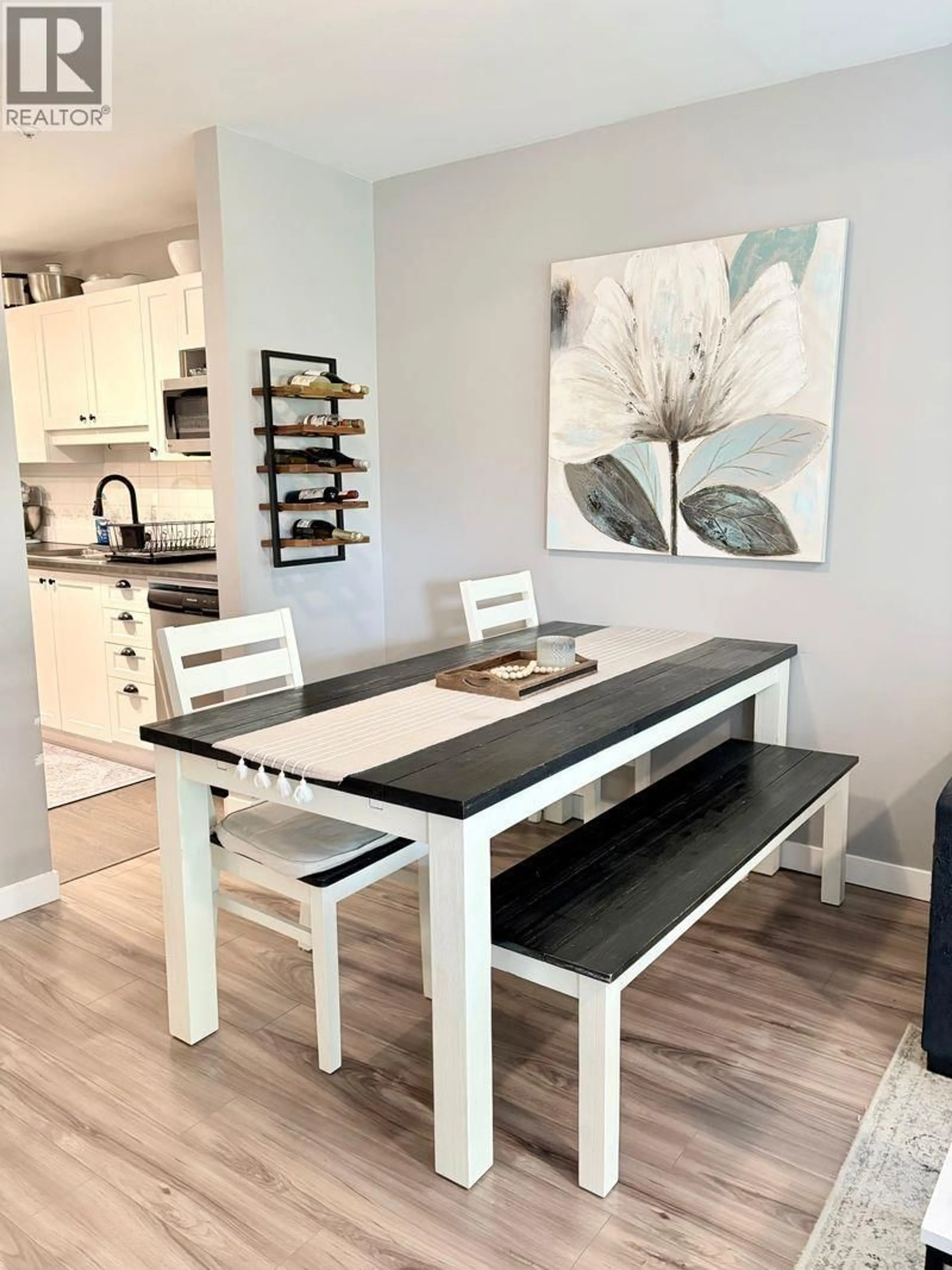 Dining room, wood/laminate floor for 402 - 888 GAUTHIER AVENUE, Coquitlam British Columbia V3K6Y1