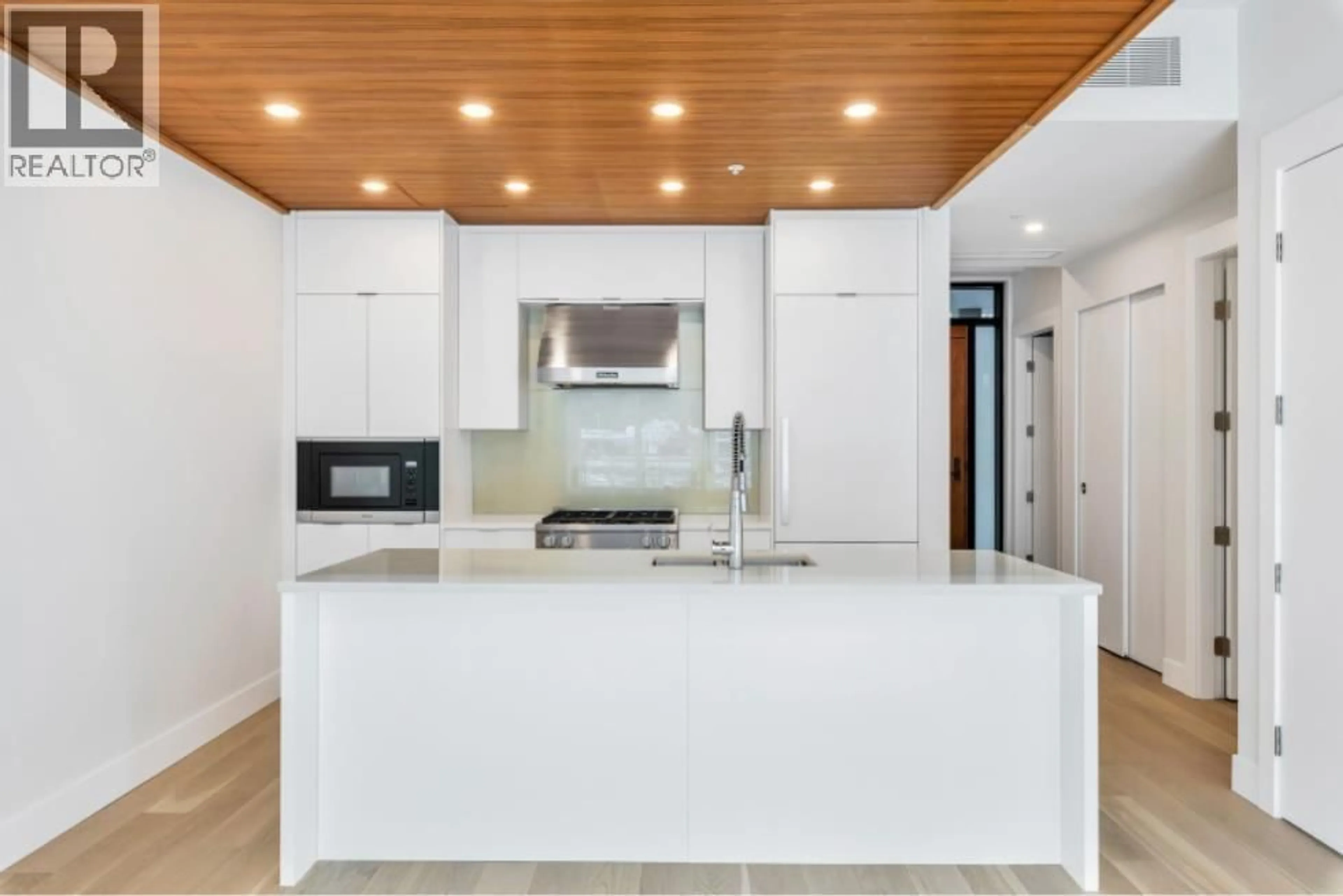 Contemporary kitchen, unknown for 205 - 6707 NELSON AVENUE, West Vancouver British Columbia V7W0A4