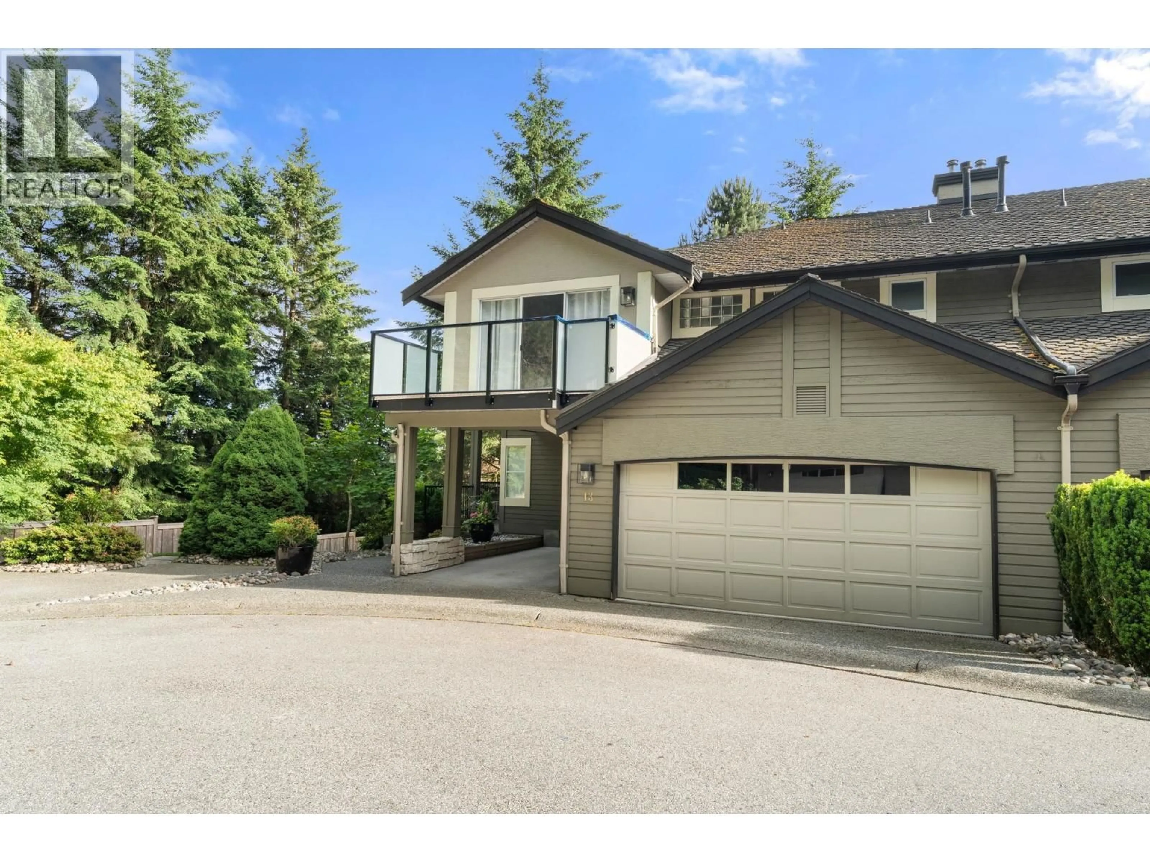 A pic from outside/outdoor area/front of a property/back of a property/a pic from drone, street for 13 - 1900 INDIAN RIVER CRESCENT, North Vancouver British Columbia V7G2R1
