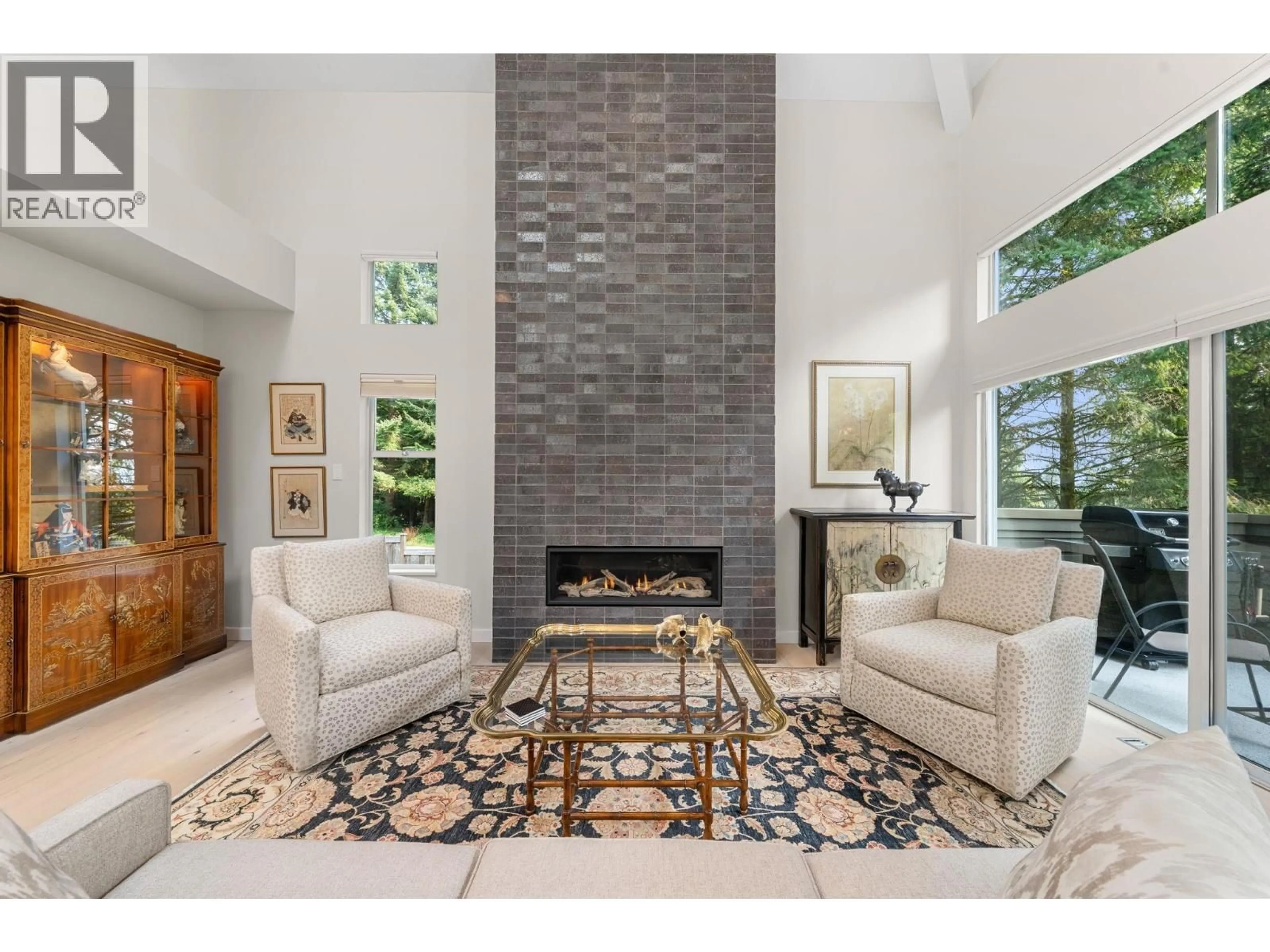 Living room with furniture, ceramic/tile floor for 13 - 1900 INDIAN RIVER CRESCENT, North Vancouver British Columbia V7G2R1