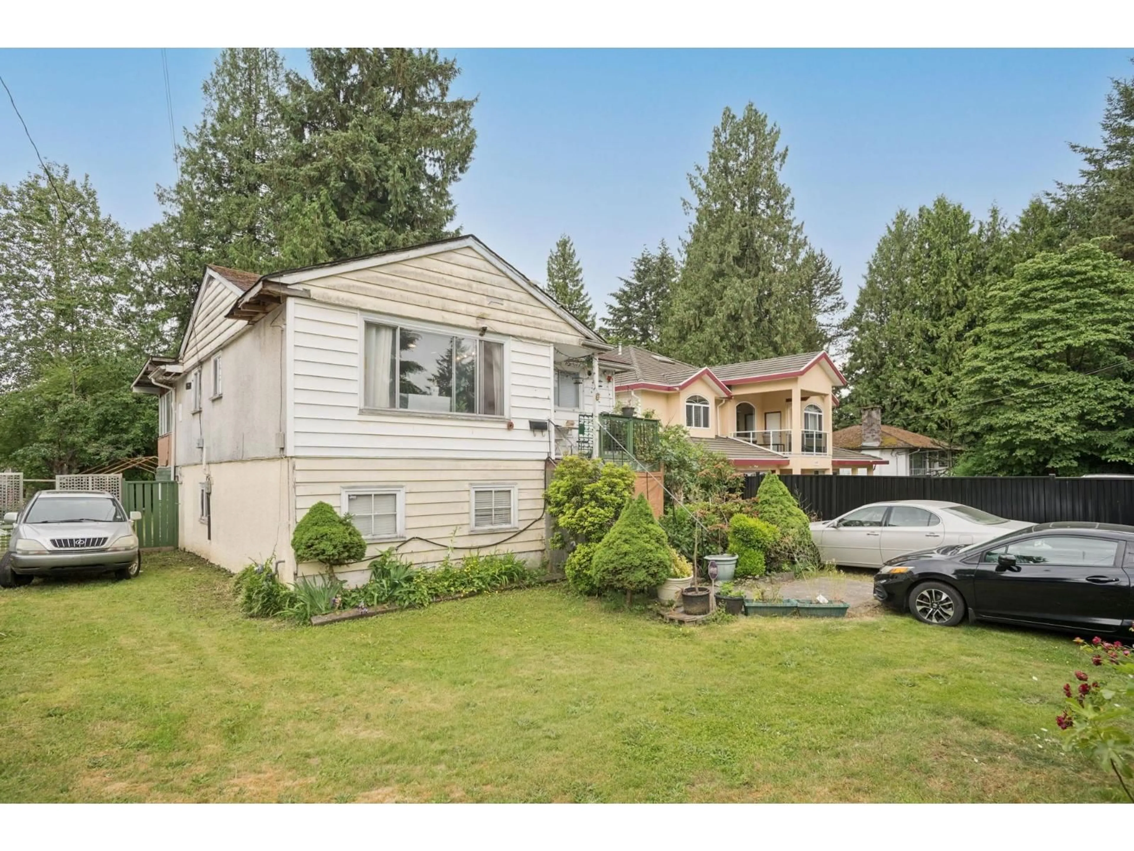 Home with vinyl exterior material, street for 12882 100 AVENUE, Surrey British Columbia V3T1G5