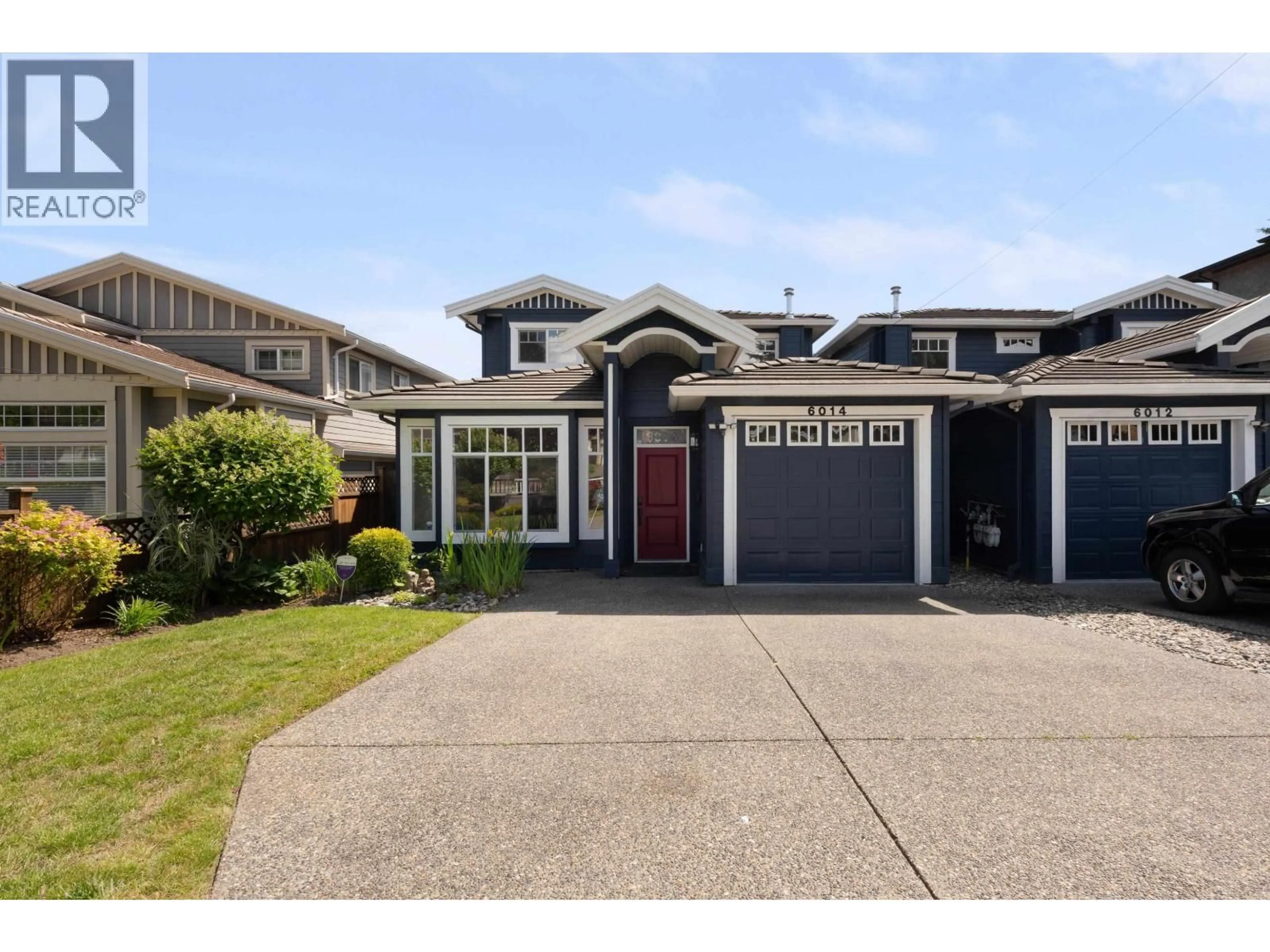 Home with vinyl exterior material, street for 6014 RUMBLE STREET, Burnaby British Columbia V5J2C5