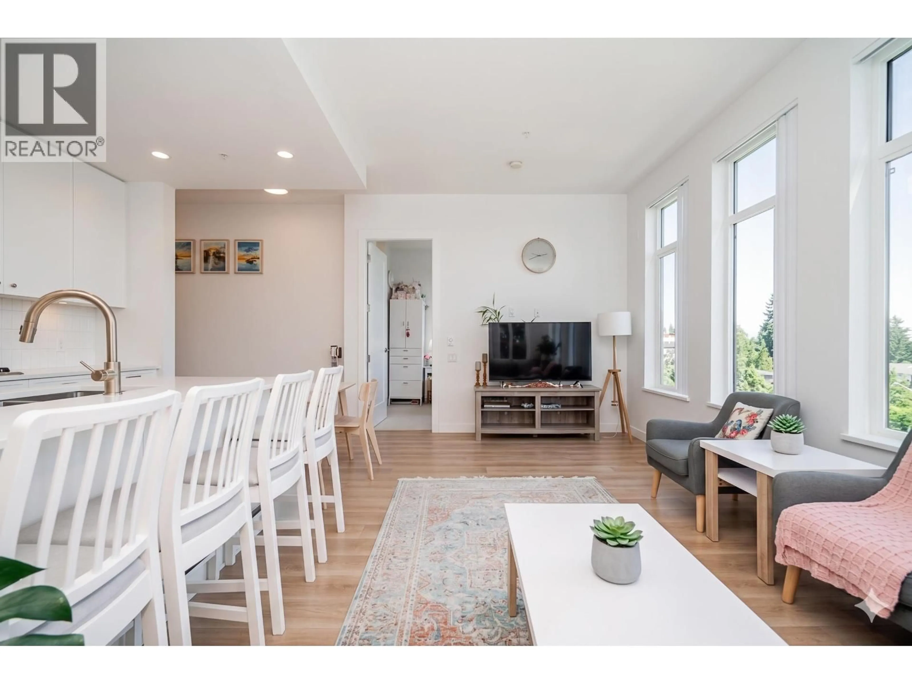 Living room with furniture, wood/laminate floor for 310 - 708 EDGAR AVENUE, Coquitlam British Columbia V3K0H3
