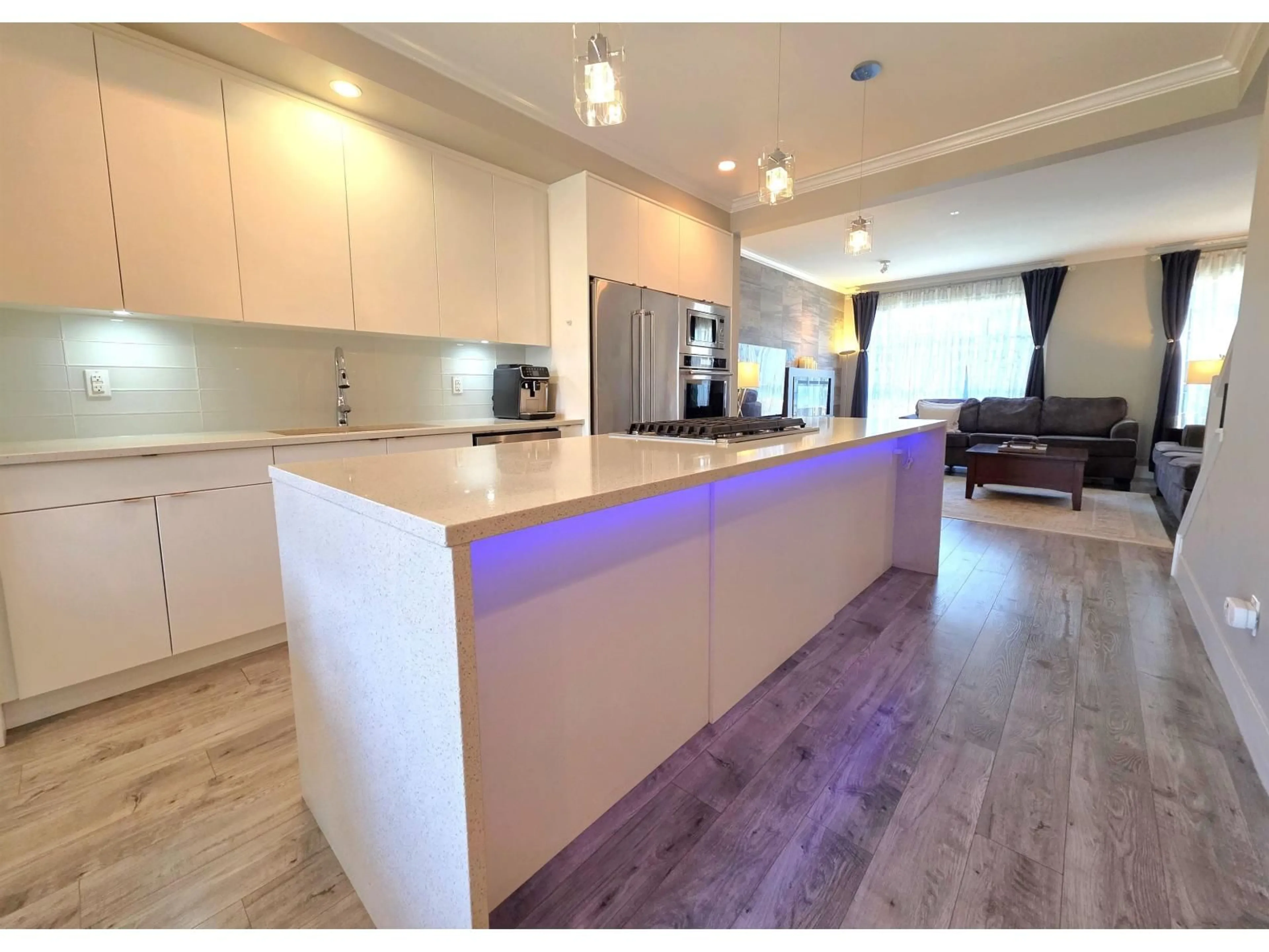 Open concept kitchen, wood/laminate floor for 148 - 16488 64 AVENUE, Surrey British Columbia V3S6X6
