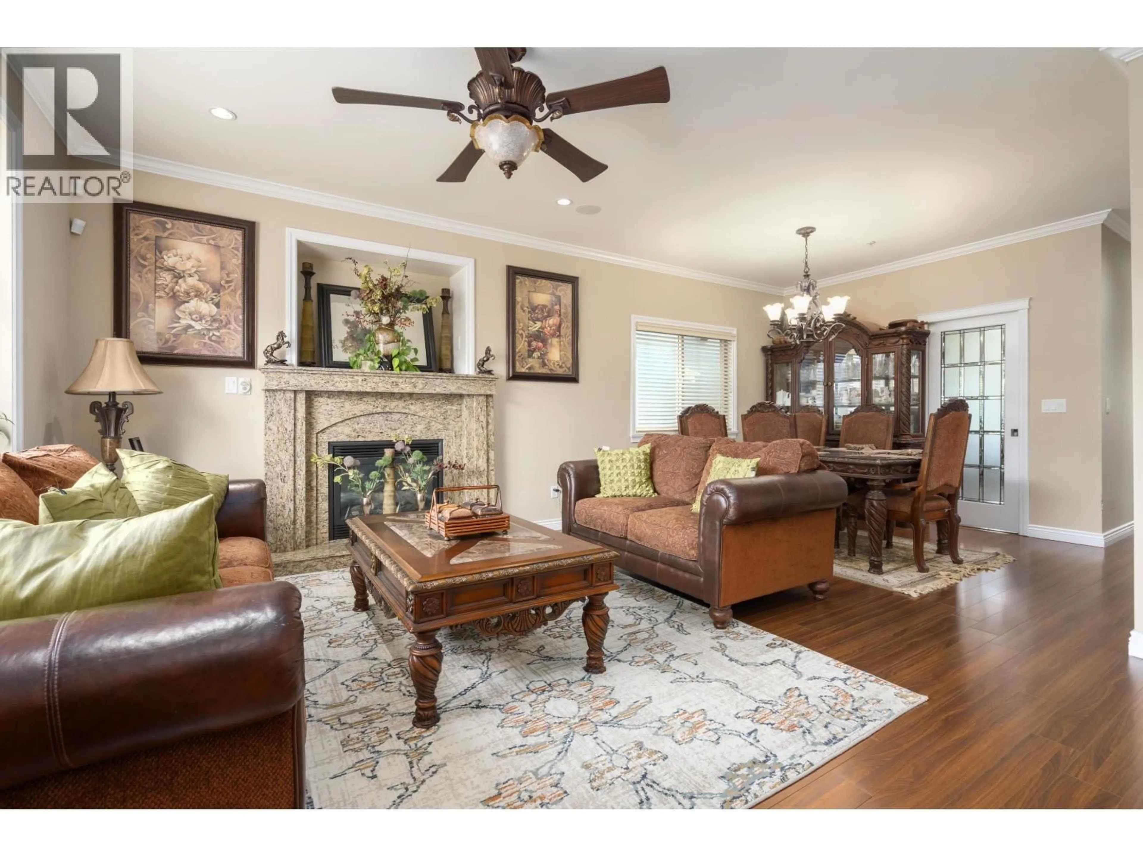 Living room with furniture, wood/laminate floor for 36 54 AVENUE, Vancouver British Columbia V5X1N4