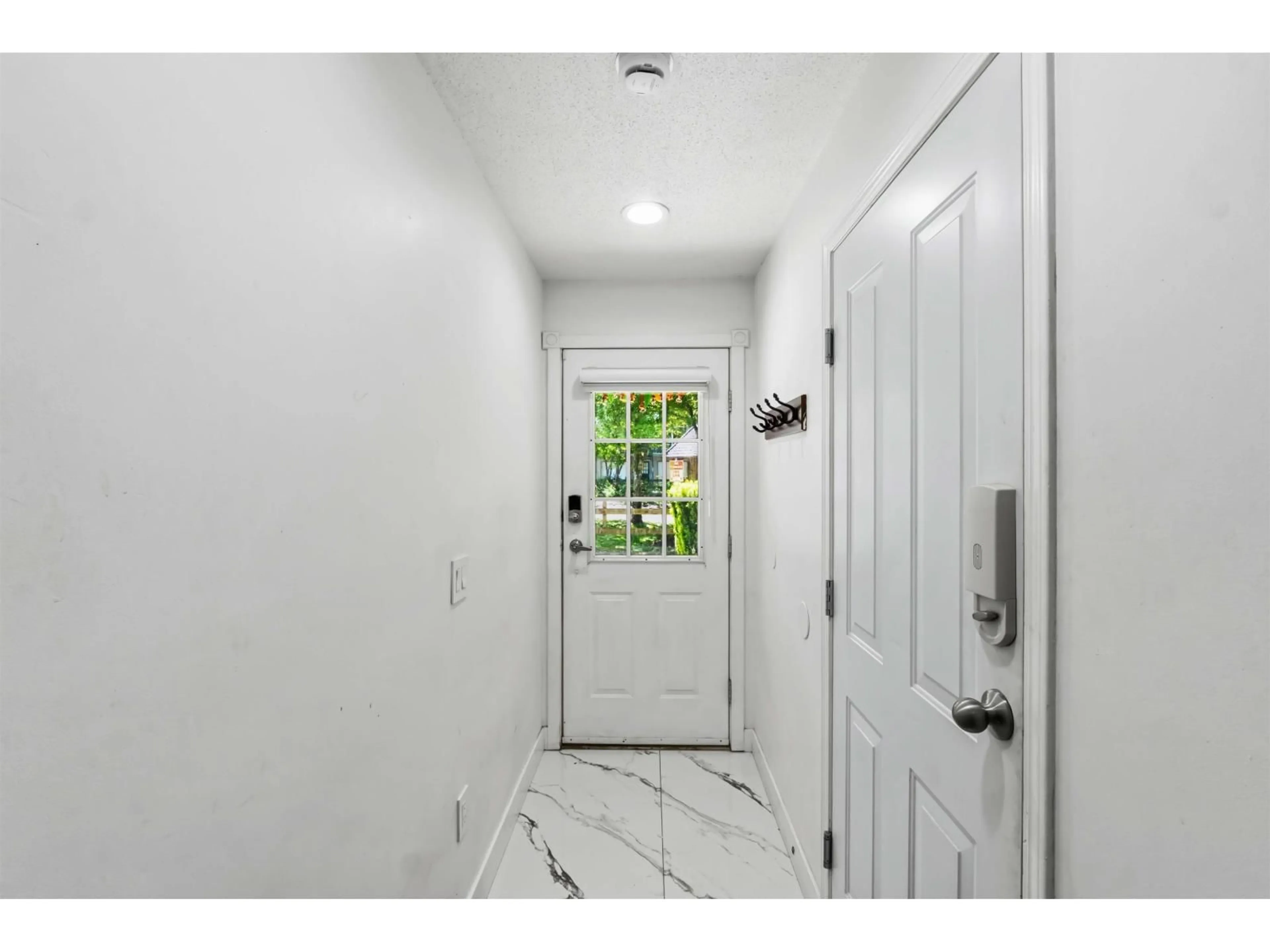 Indoor entryway for 43 - 12778 66 AVENUE, Surrey British Columbia V3K1K9