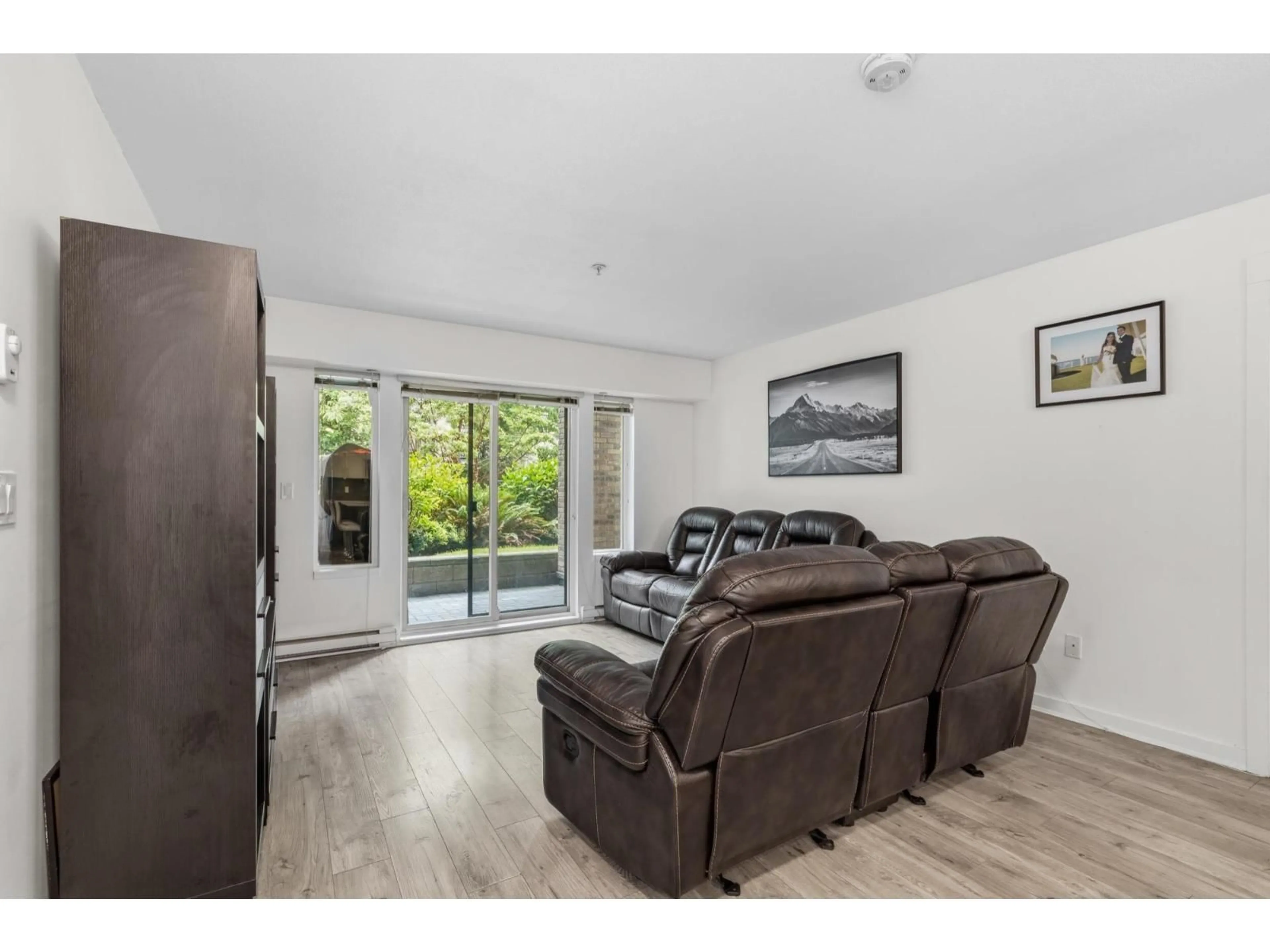 Living room with furniture, wood/laminate floor for 206 - 8695 160 STREET, Surrey British Columbia V4N6L6
