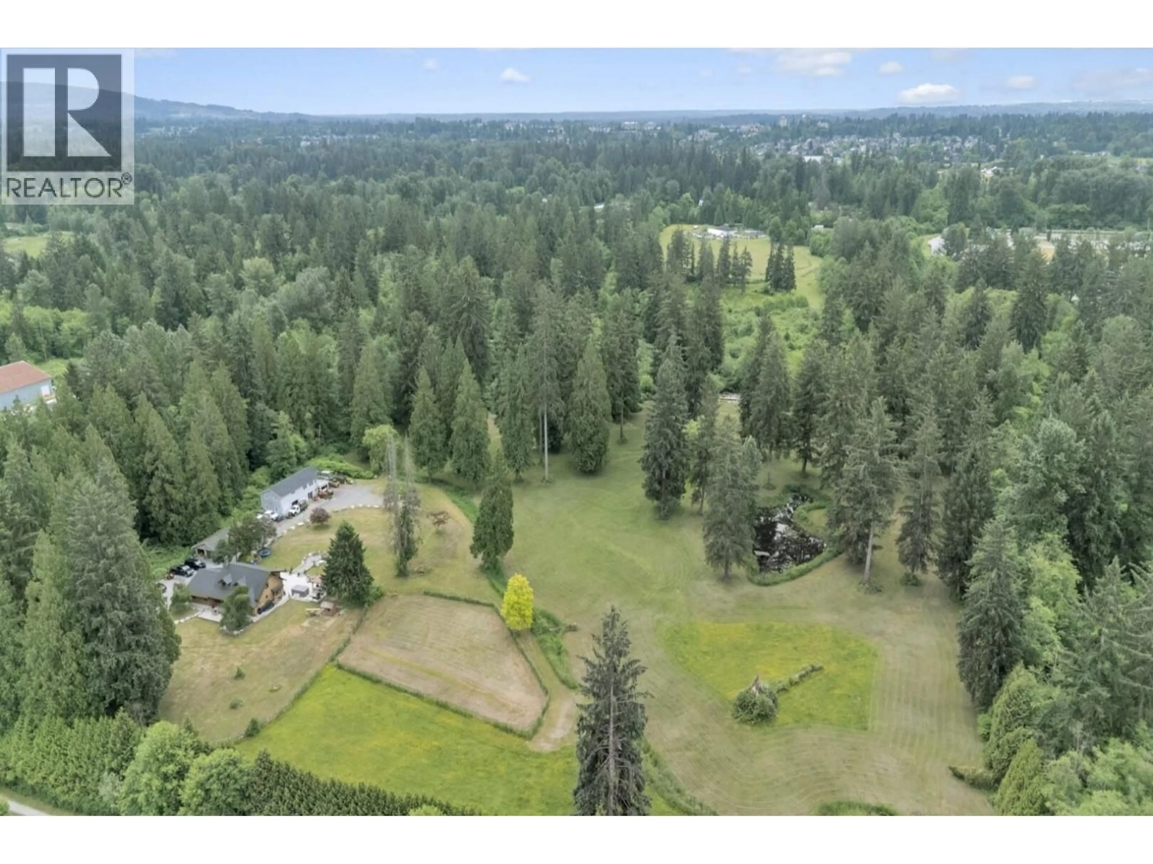 A pic from outside/outdoor area/front of a property/back of a property/a pic from drone, forest/trees view for 22050 136 AVENUE, Maple Ridge British Columbia V4R2P7