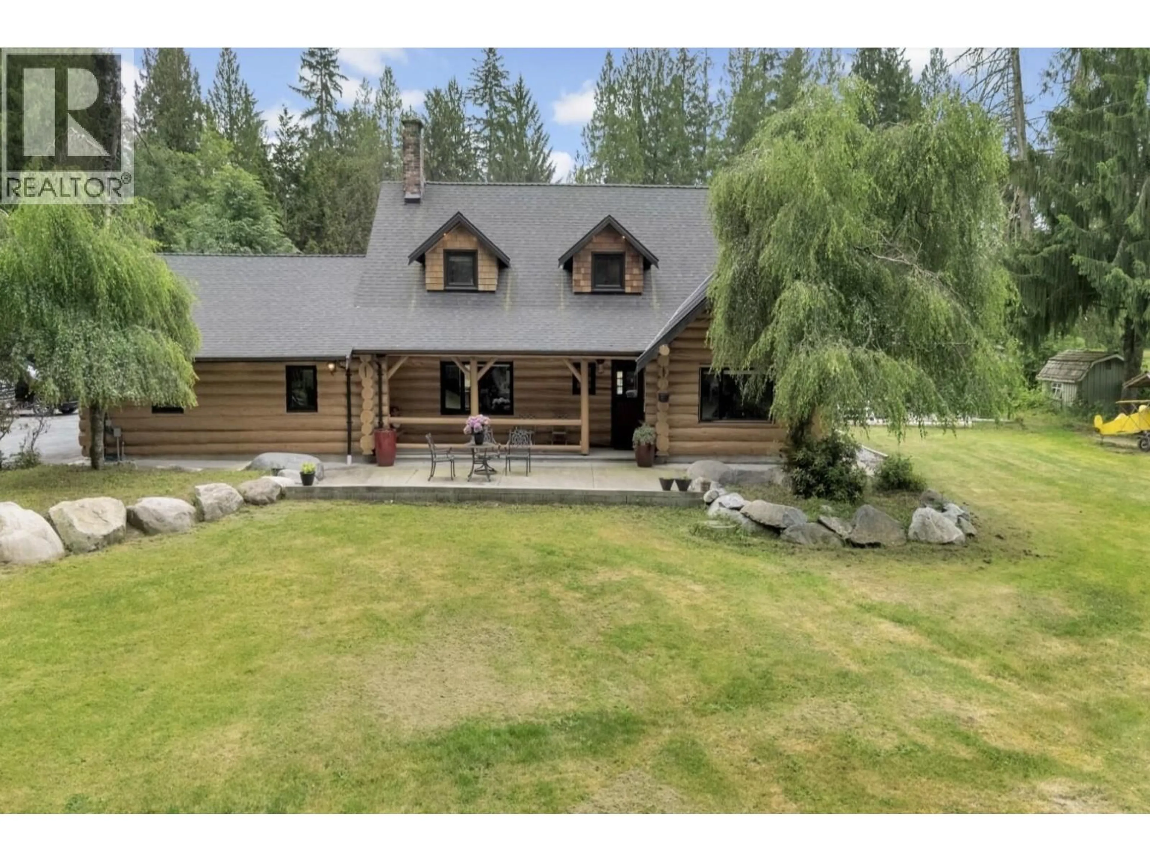 A pic from outside/outdoor area/front of a property/back of a property/a pic from drone, mountain view for 22050 136 AVENUE, Maple Ridge British Columbia V4R2P7