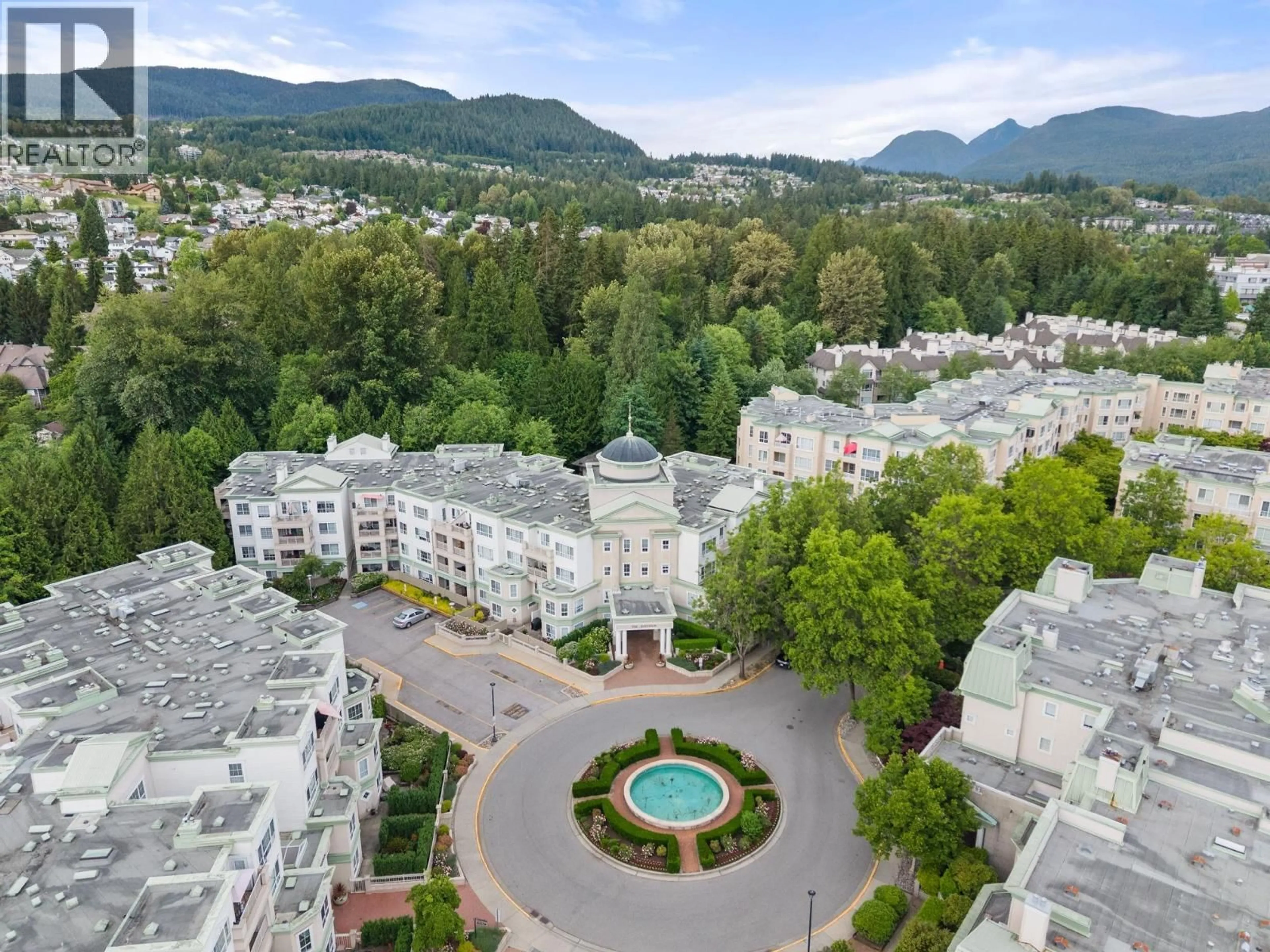 A pic from outside/outdoor area/front of a property/back of a property/a pic from drone, mountain view for 209 - 2975 PRINCESS CRESCENT, Coquitlam British Columbia V3B7N3