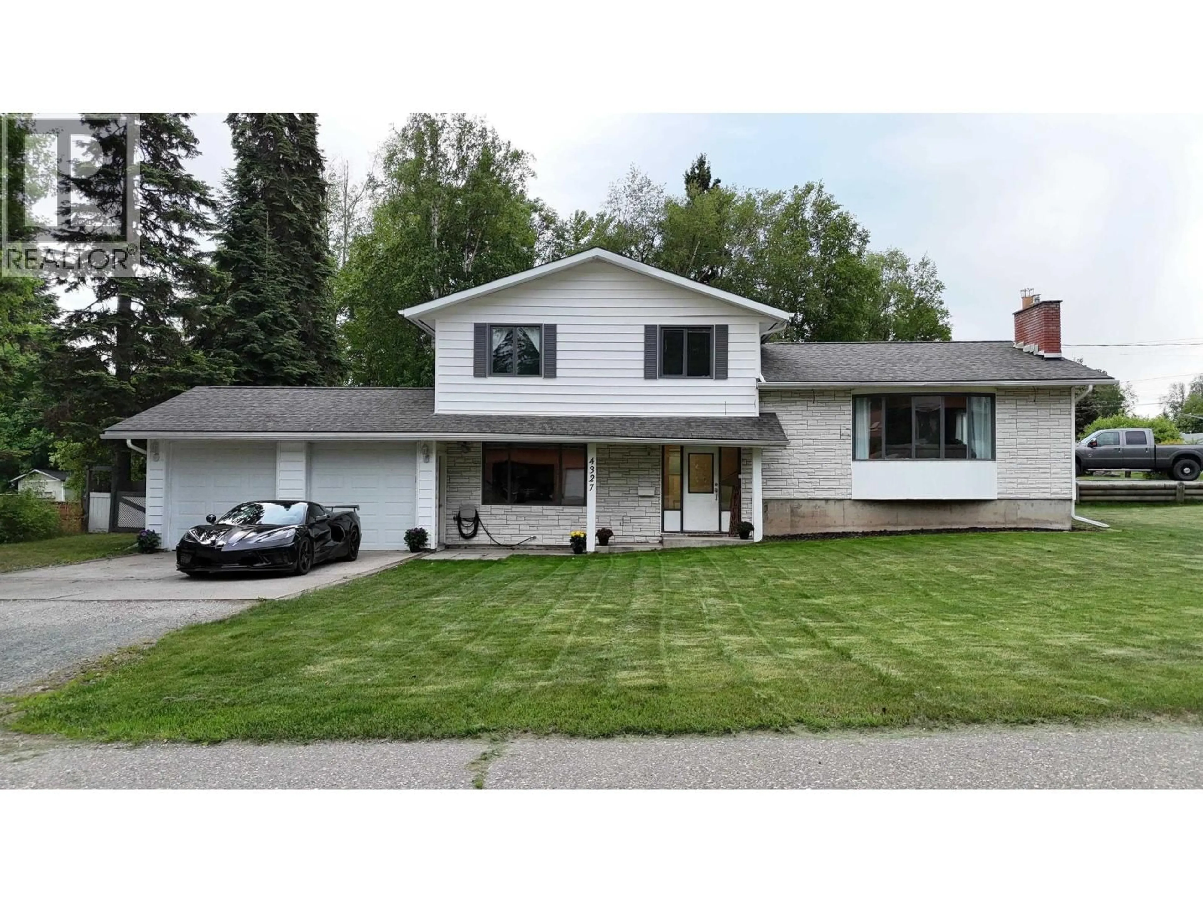 Home with vinyl exterior material, street for 4327 MONTGOMERY CRESCENT, Prince George British Columbia V2K2E4