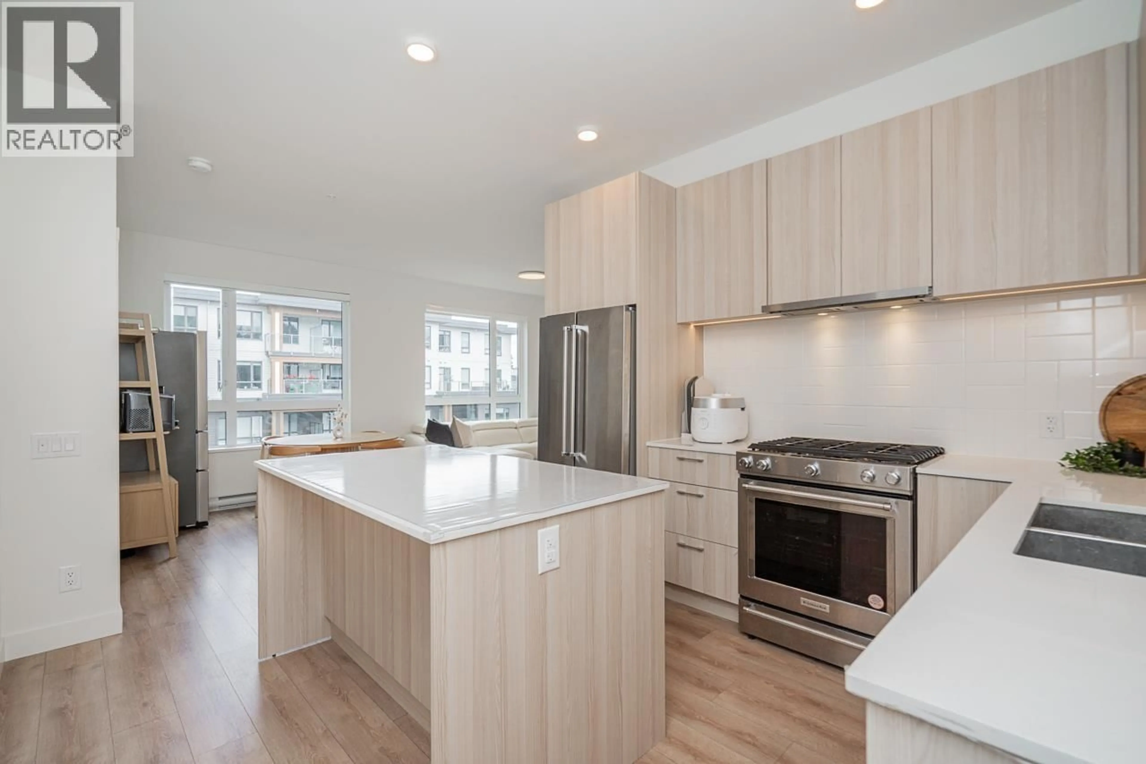 Open concept kitchen, wood/laminate floor for 505 - 741 ANSKAR COURT, Coquitlam British Columbia V3J4J3