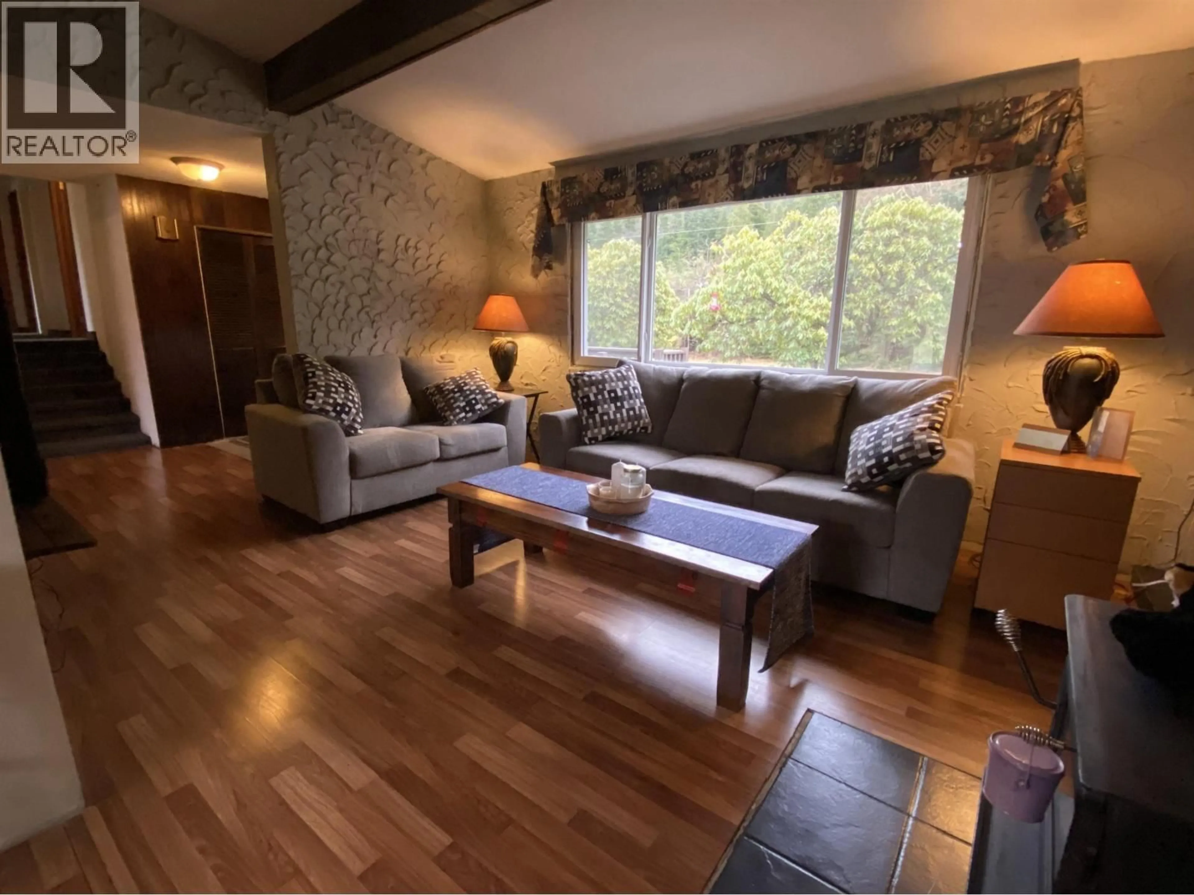 Living room with furniture, wood/laminate floor for 5203 GOSSEN CREEK STREET, Terrace British Columbia V8G0A6