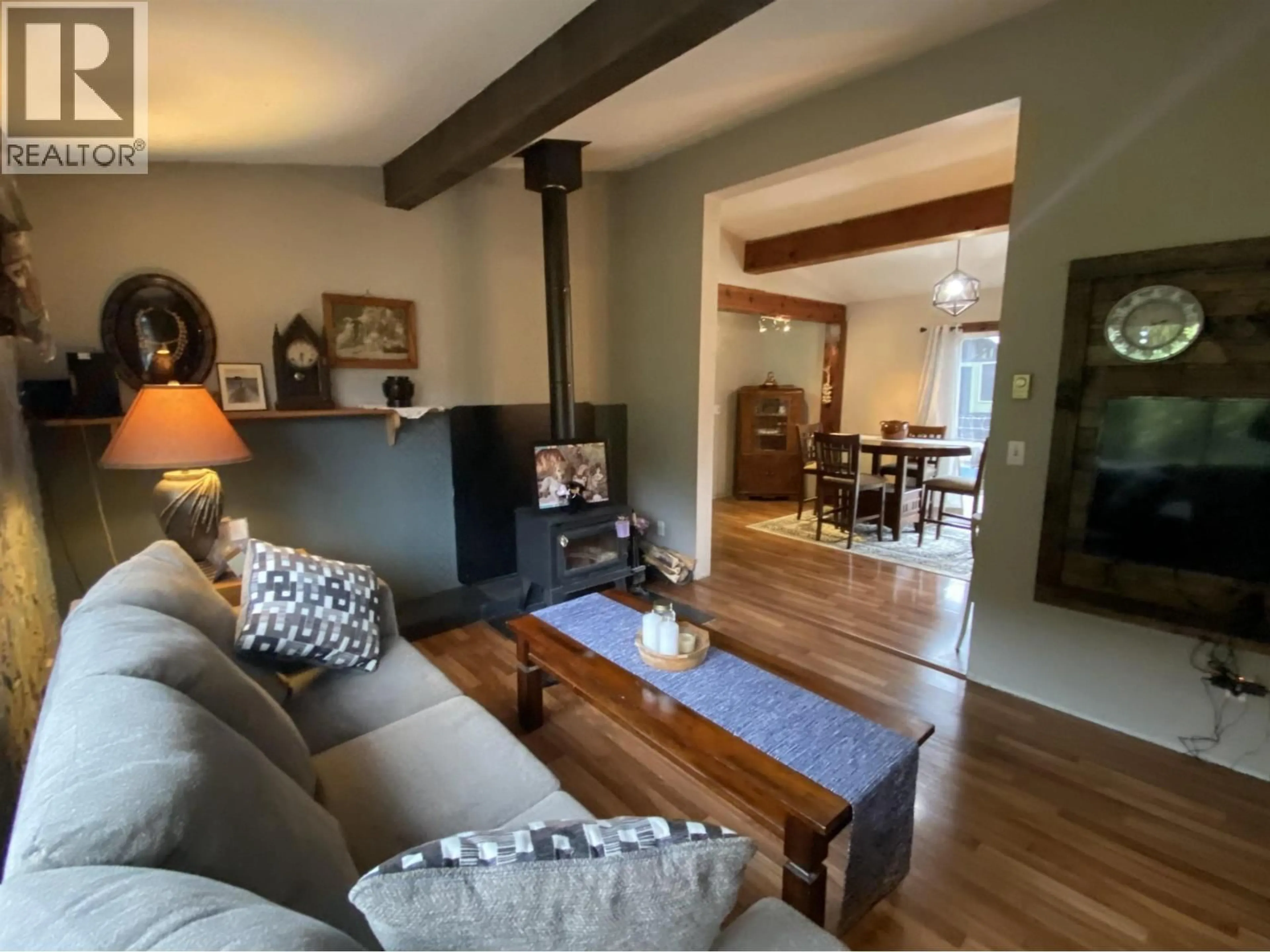 Living room with furniture, wood/laminate floor for 5203 GOSSEN CREEK STREET, Terrace British Columbia V8G0A6
