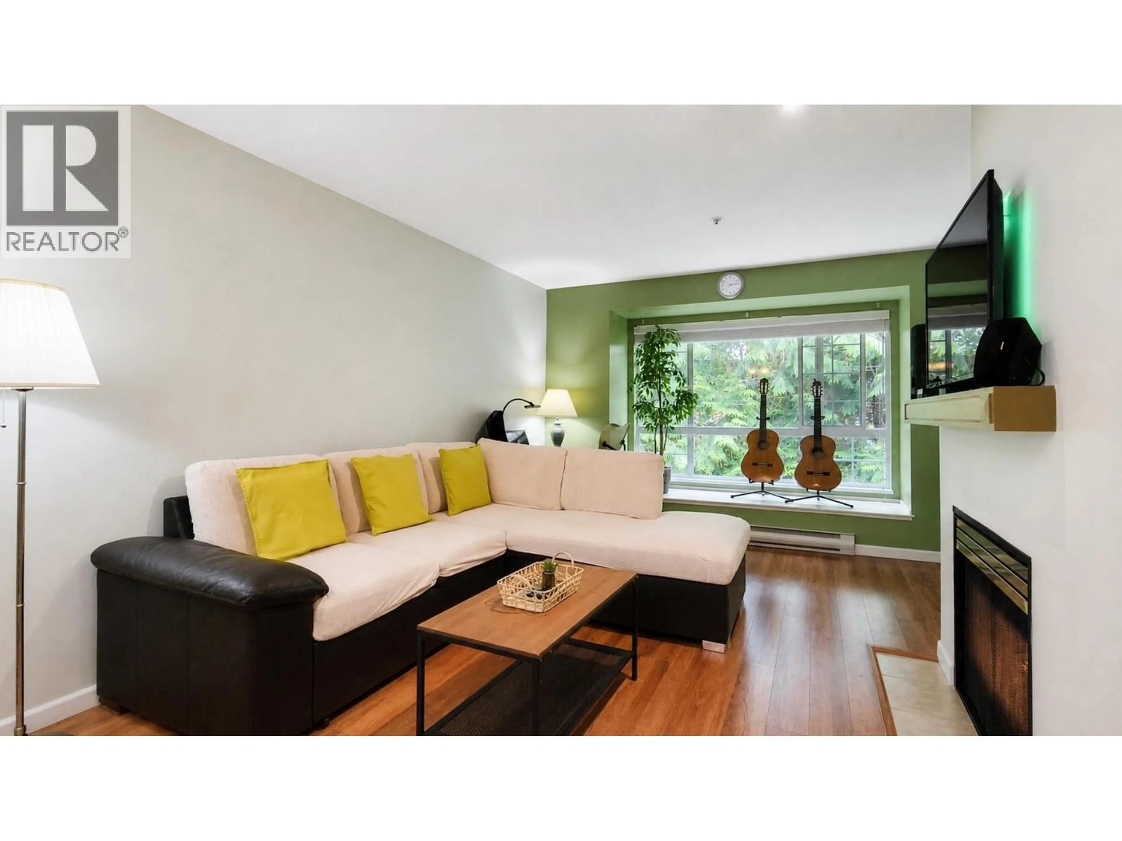 Living room with furniture, wood/laminate floor for 333 - 1252 TOWN CENTRE BOULEVARD, Coquitlam British Columbia V3B7R7