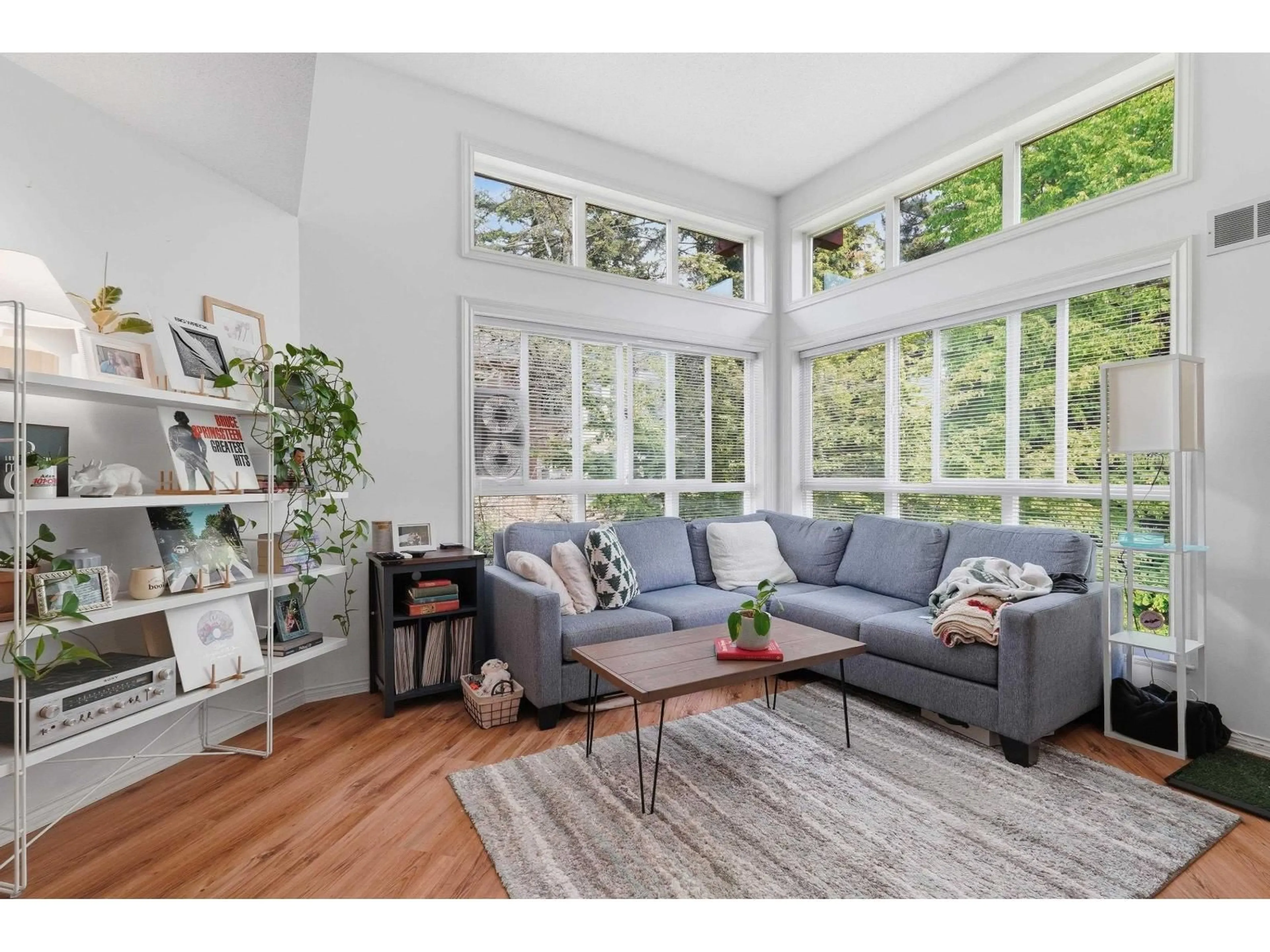 Living room with furniture, wood/laminate floor for 309 - 15342 20 AVENUE, Surrey British Columbia V4A2A2