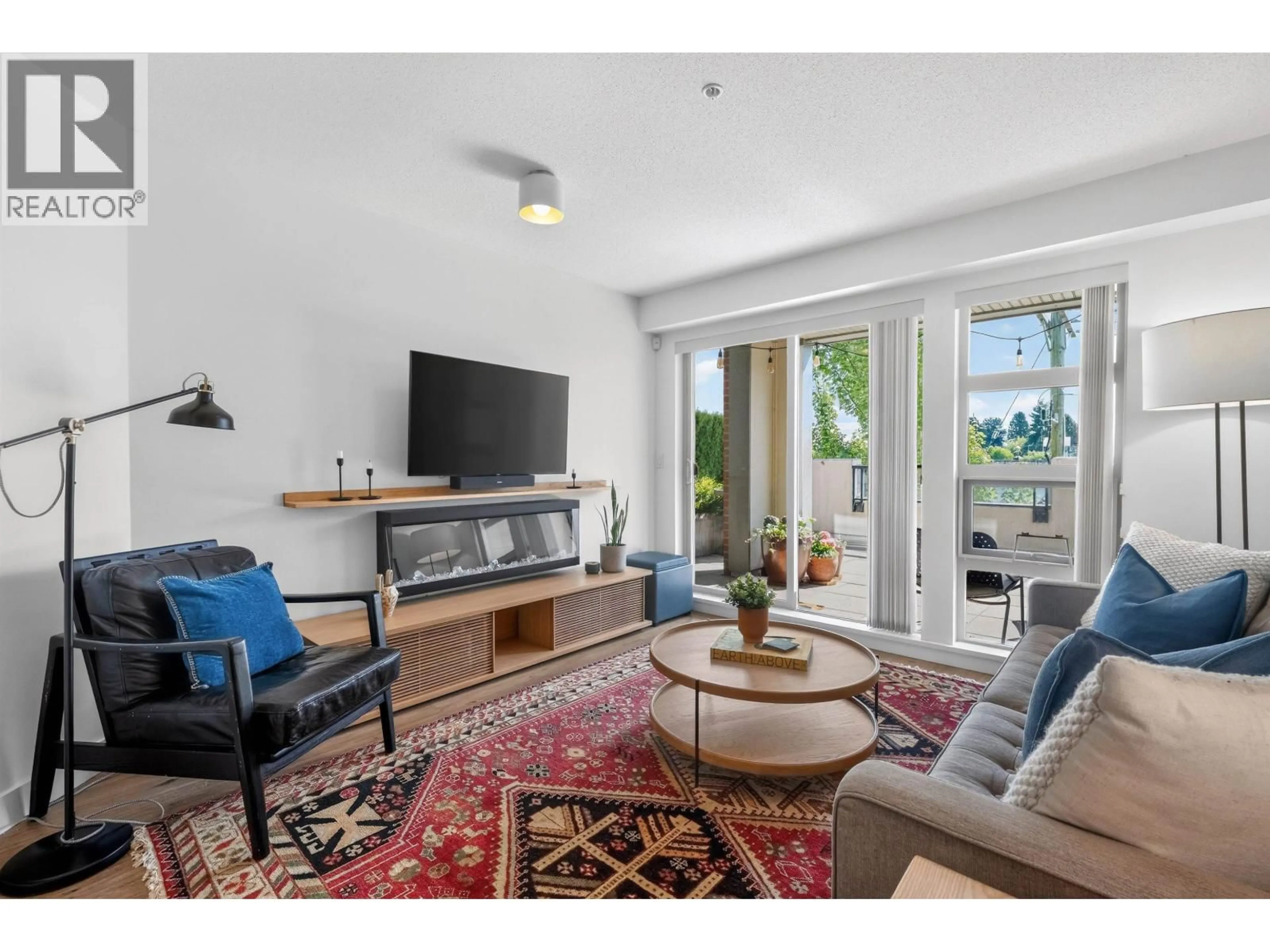 Living room with furniture, unknown for 222 - 4550 FRASER STREET, Vancouver British Columbia V5V4G8