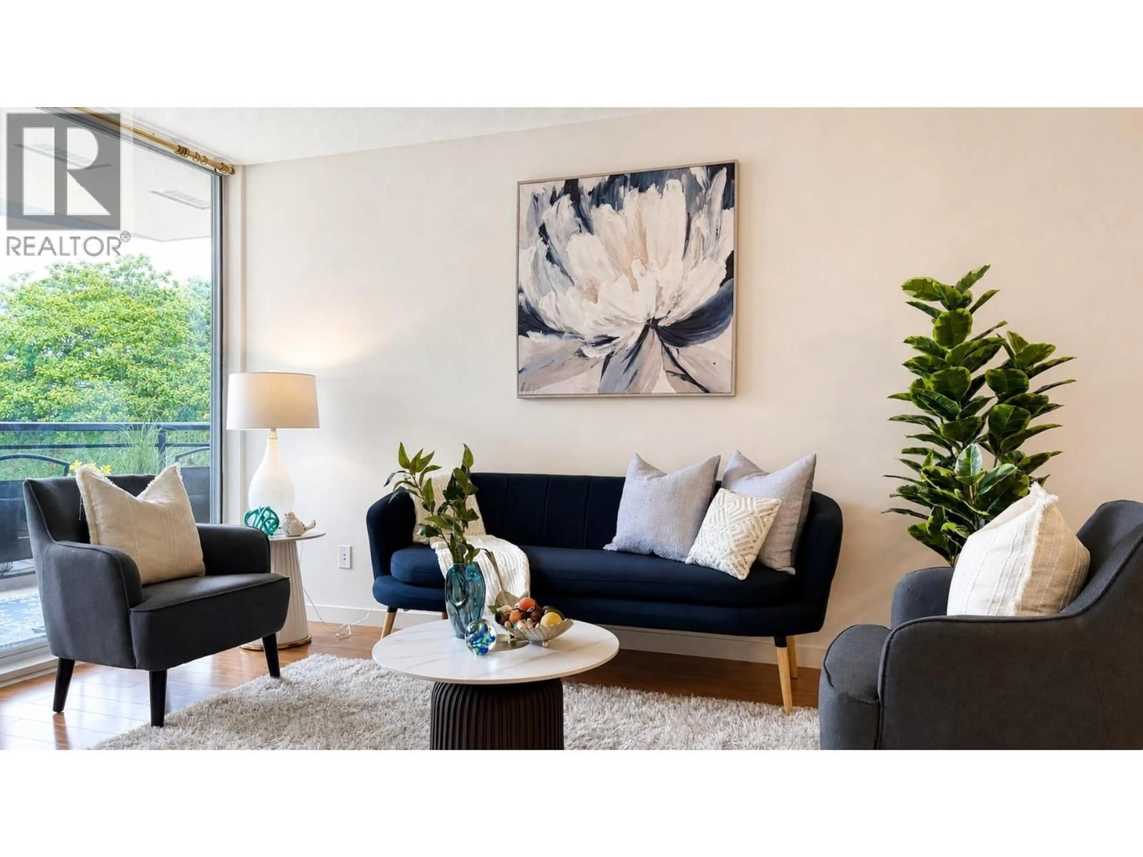 Living room with furniture, wood/laminate floor for 301 - 8480 GRANVILLE AVENUE, Richmond British Columbia V6Y4E8