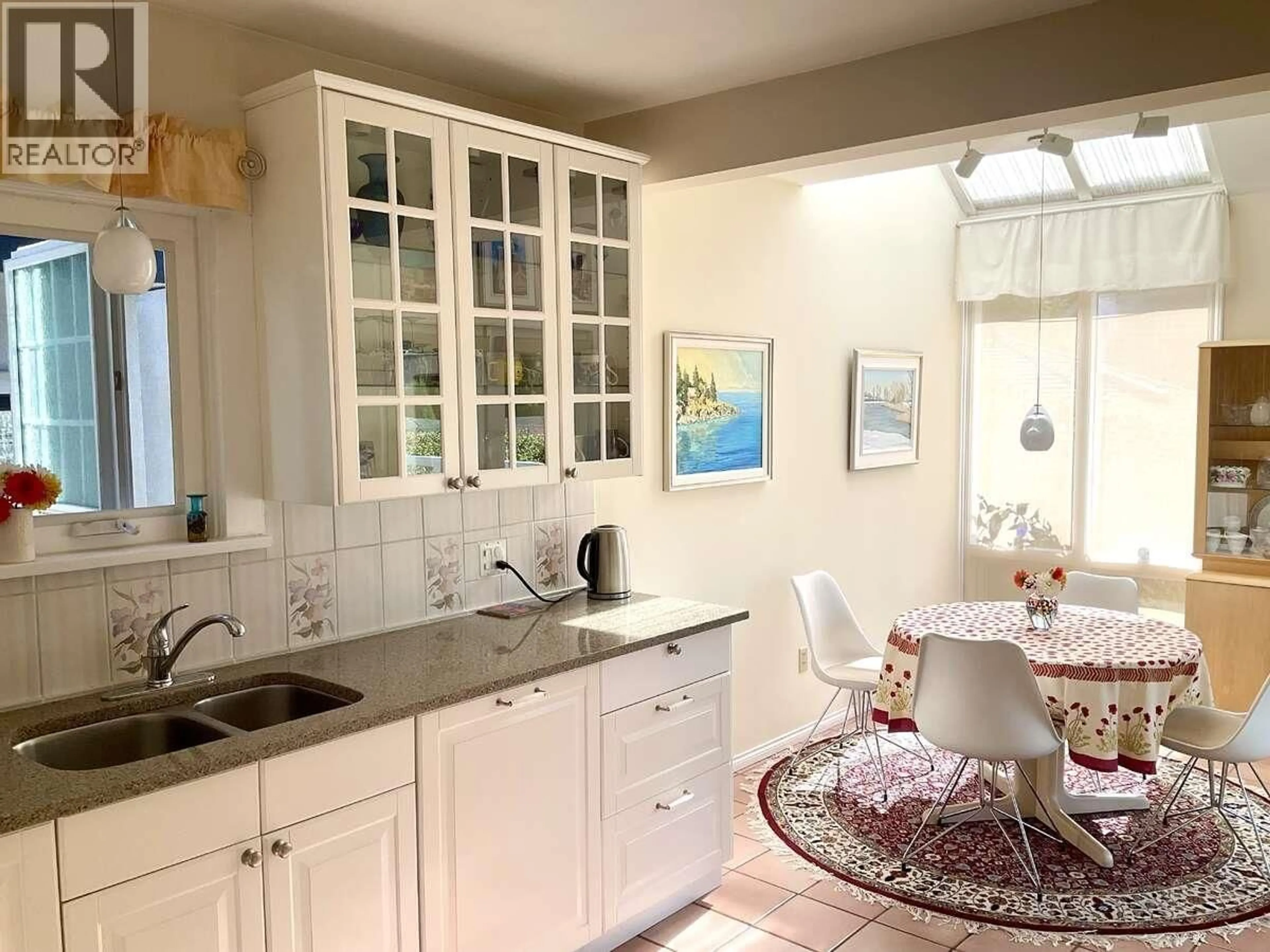 Open concept kitchen, ceramic/tile floor for 3974 18TH AVENUE, Vancouver British Columbia V6S1B7