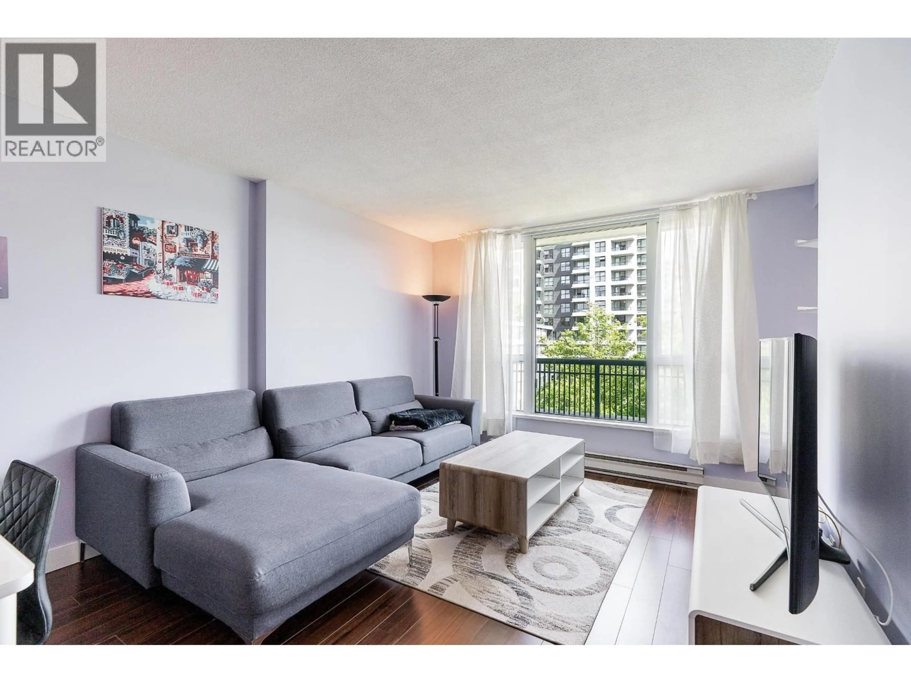 Living room with furniture, unknown for 504 - 5189 GASTON STREET, Vancouver British Columbia V5R6C7
