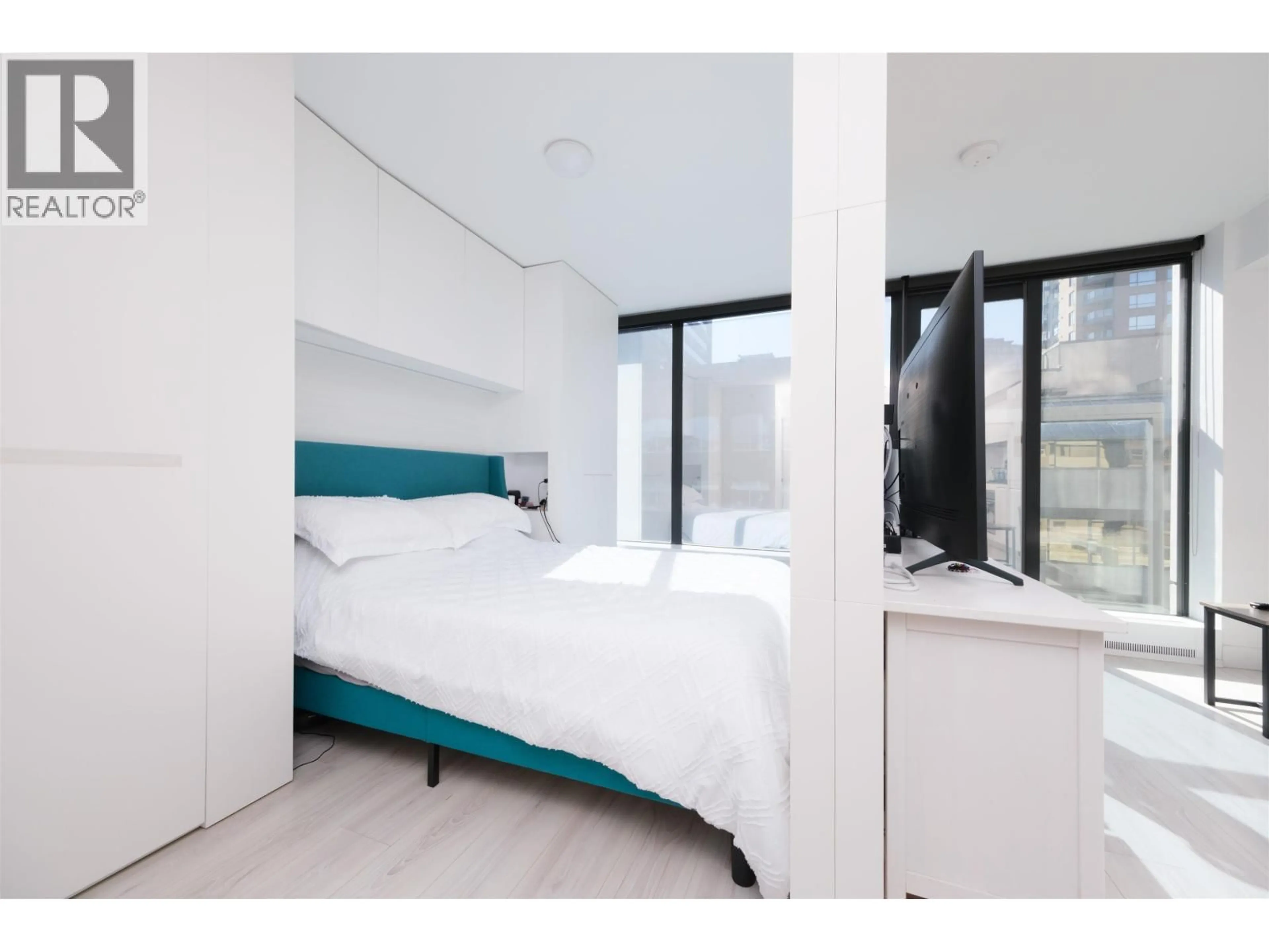 Bedroom with bed, unknown for 703 - 1133 HORNBY STREET, Vancouver British Columbia V6Z1W1
